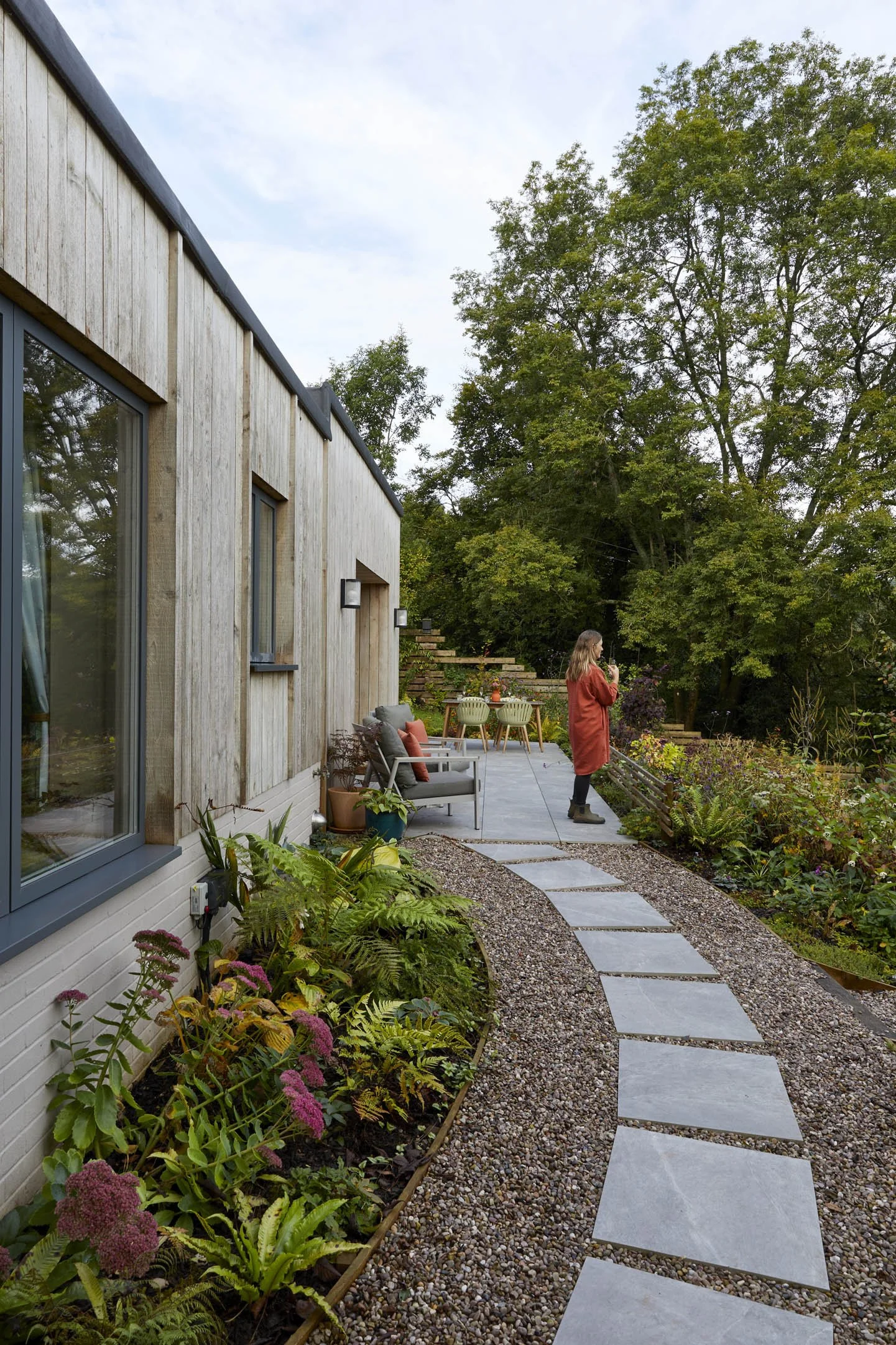 Nature-inspired architecture surrounded by mature woodland in rural Gloucestershire.