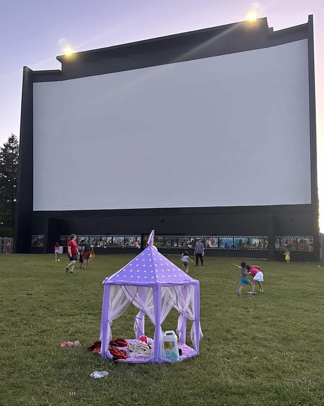 Kids love to play under the big screen here at the drive-in in McHenry! The outdoor is a great place for a family outing!