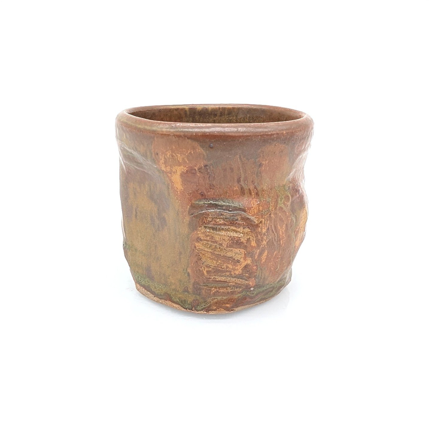 Ash-glazed teabowl (I love my matcha).
I love how the glaze moves over textures and goes from green to brown. 

-
#art #clay #ceramic #pottery