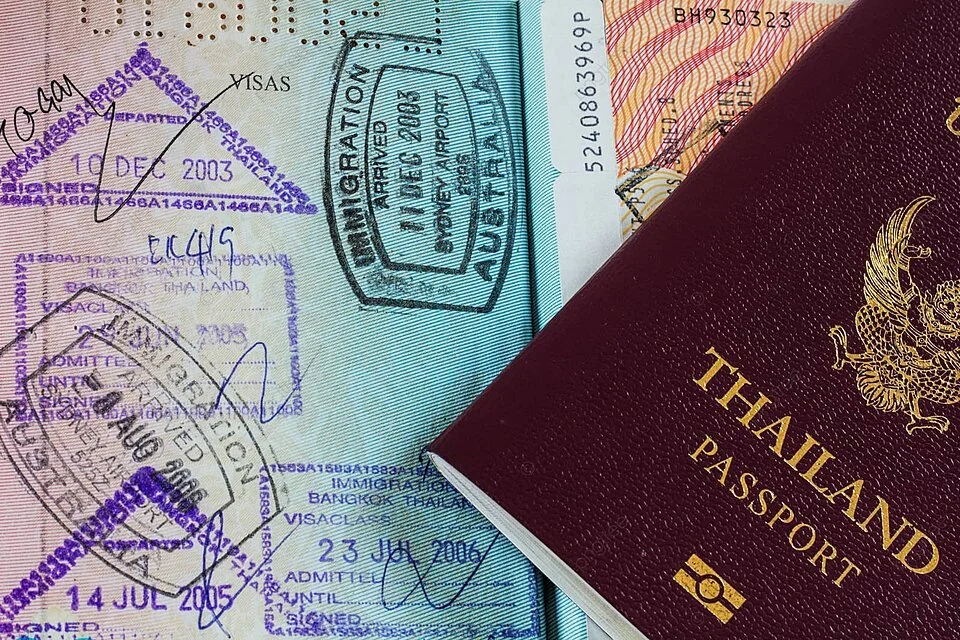 pngtree-thai-passport-with-stamps-visa-official-tourist-photo-image_32727774.jpg