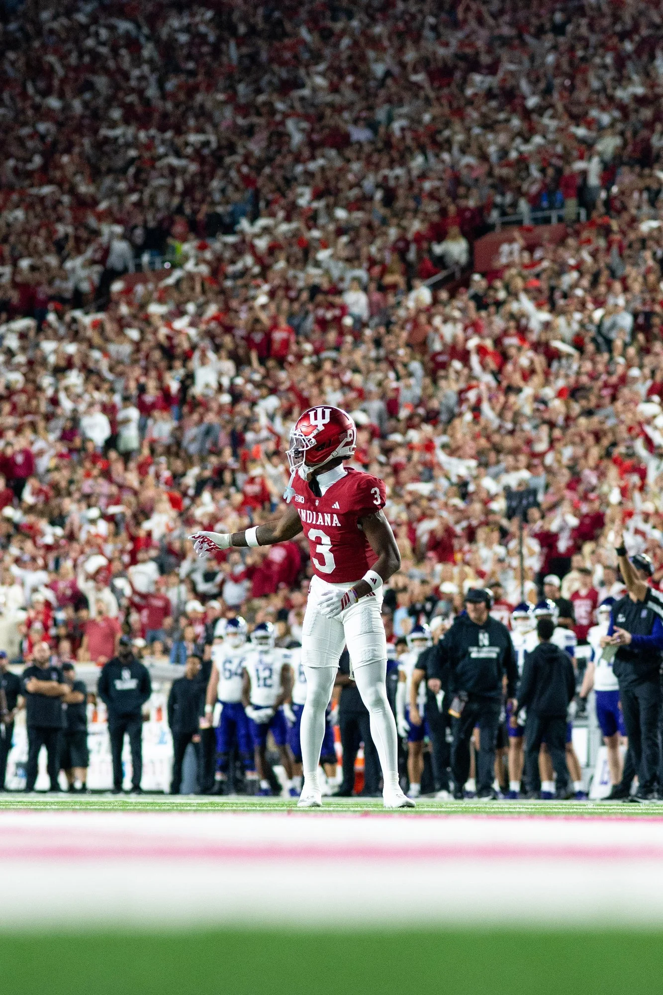 Indiana player celebrating in front of a roaring home crowd.
