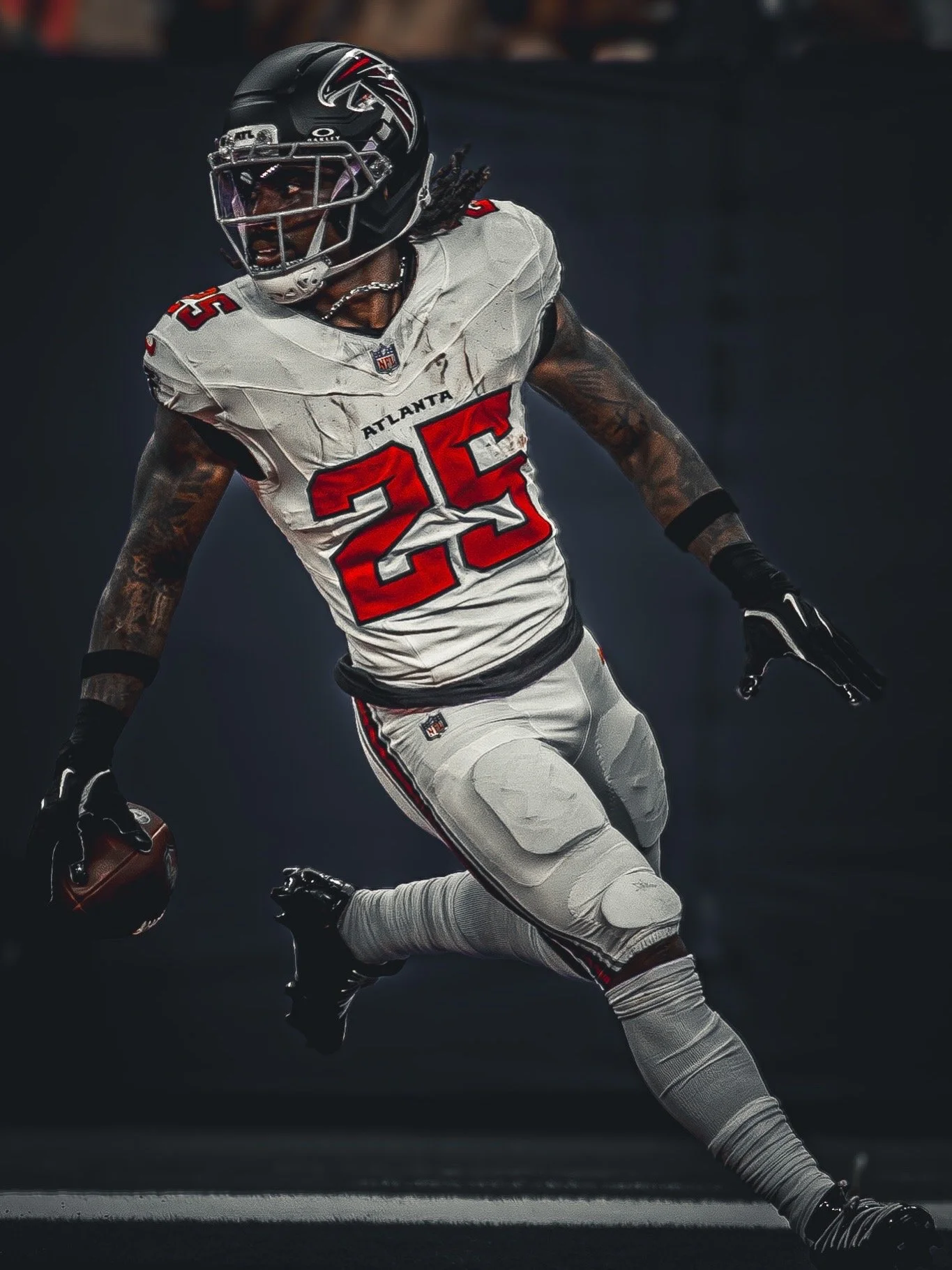 Atlanta Falcons running back #25 carrying the ball upfield