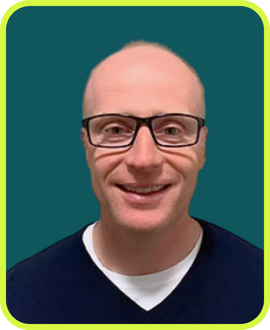 Headshot of David Poland, LMHC, outpatient therapist at BrainWise, smiling confidently against a neutral background.