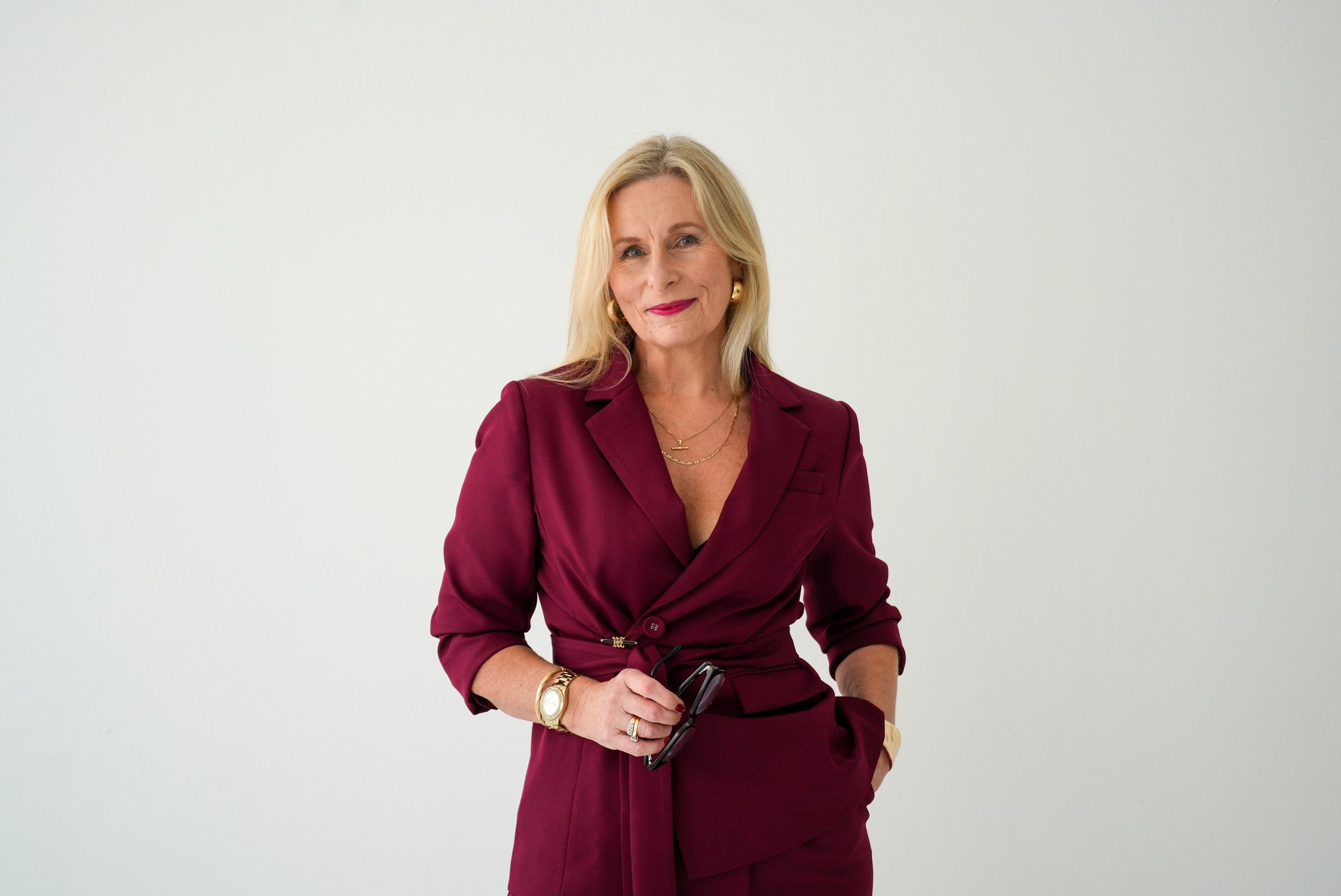 Michelle Cuneo, experienced Central Coast therapist and founder of Red Thread Relationships, featured in brand portrait for professional therapy services.