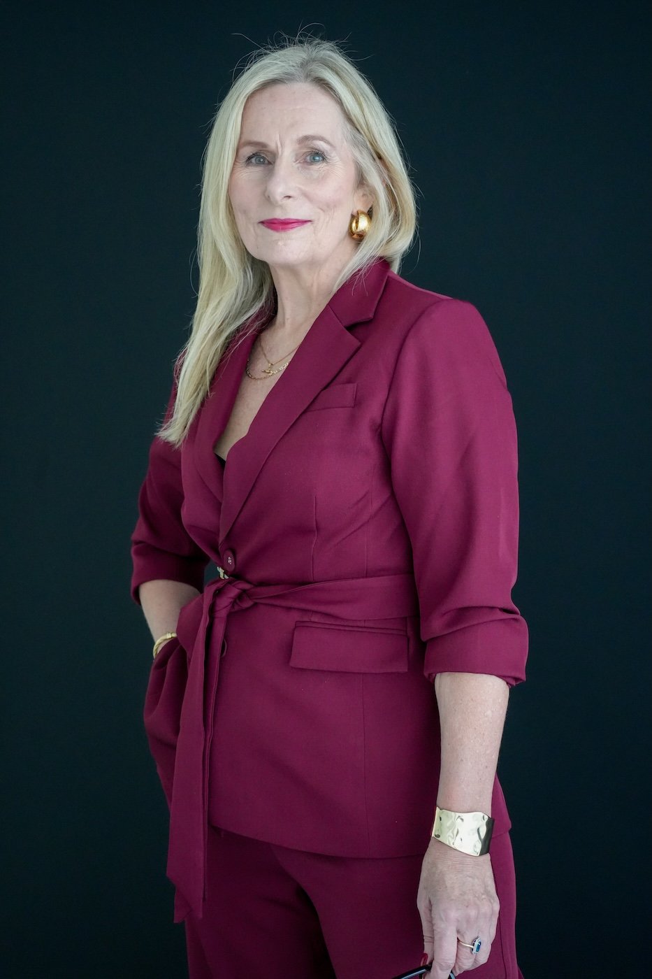 Michelle Cuneo of Red Thread Relationships, pictured in deep brand tones, providing couples therapy and individual counselling on the Central Coast.