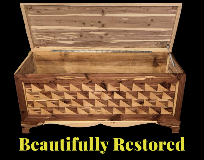 A restored 75 year old Aromatic Cedar Hope Chest with a hinged lid, featuring a geometric pattern on the front, and the text 'Beautifully Restored' in yellow at the bottom.