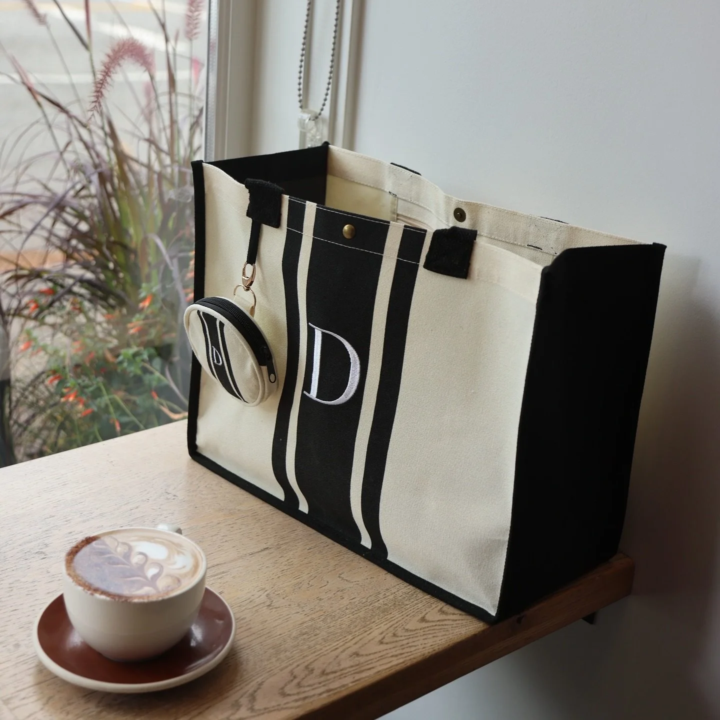 Say hello to your new favorite tote! ✨ 
Customize it with your initials and add a personal touch to your everyday look. 

This bag is a must-have. Now available on Amazon! 🖤

 #customtotebag #personalizedbags #shopamazon #styleessentials