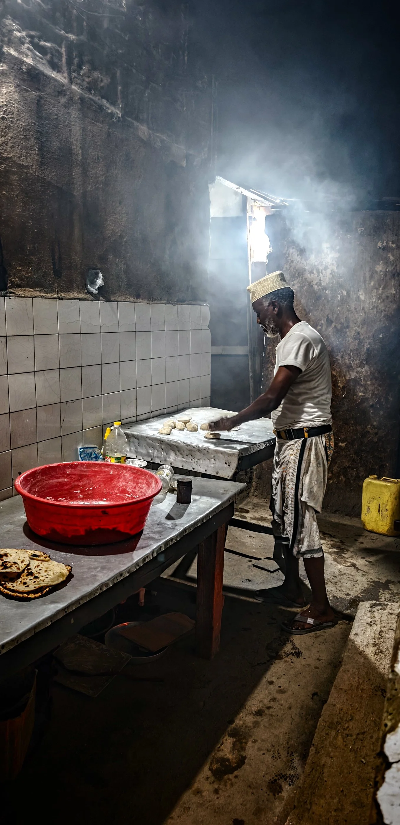 Preparing Flat Bread ( Khubz)