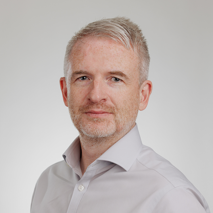 James Coghlan looking at camera