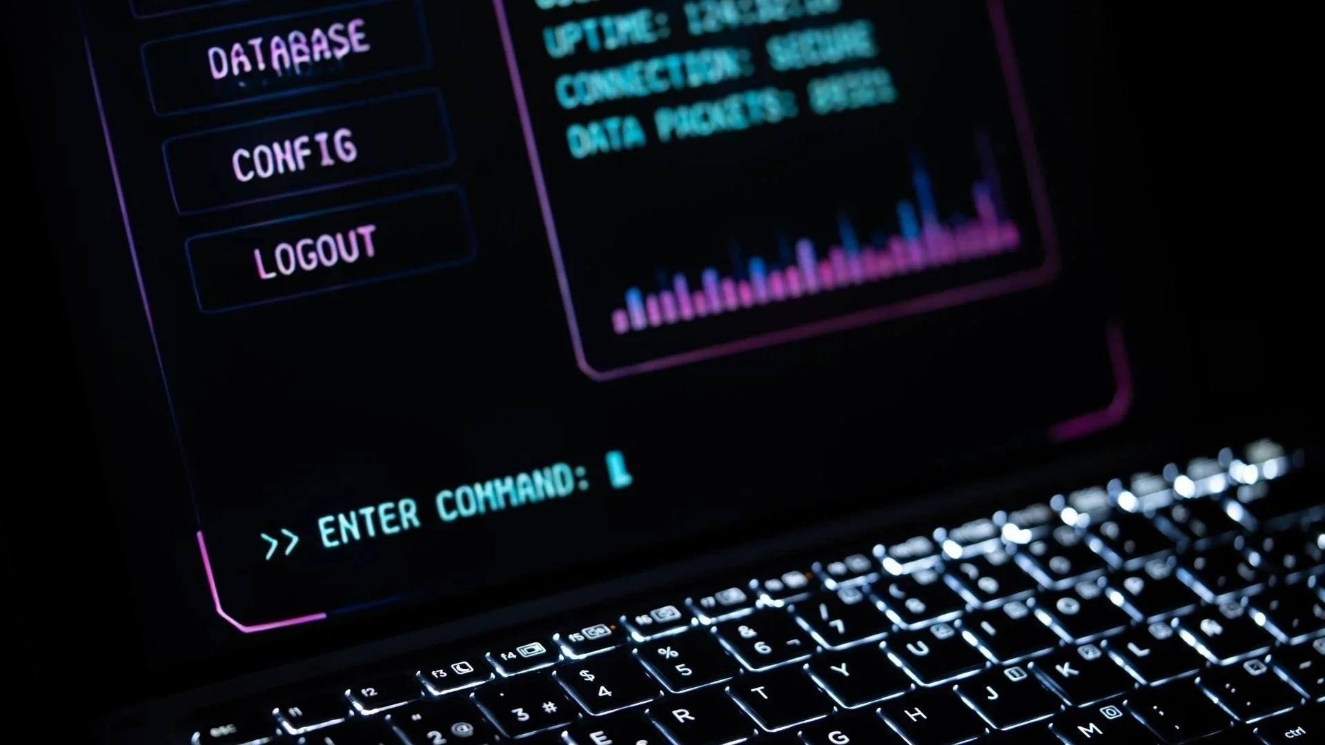 A laptop screen in a dark room with cyber security details