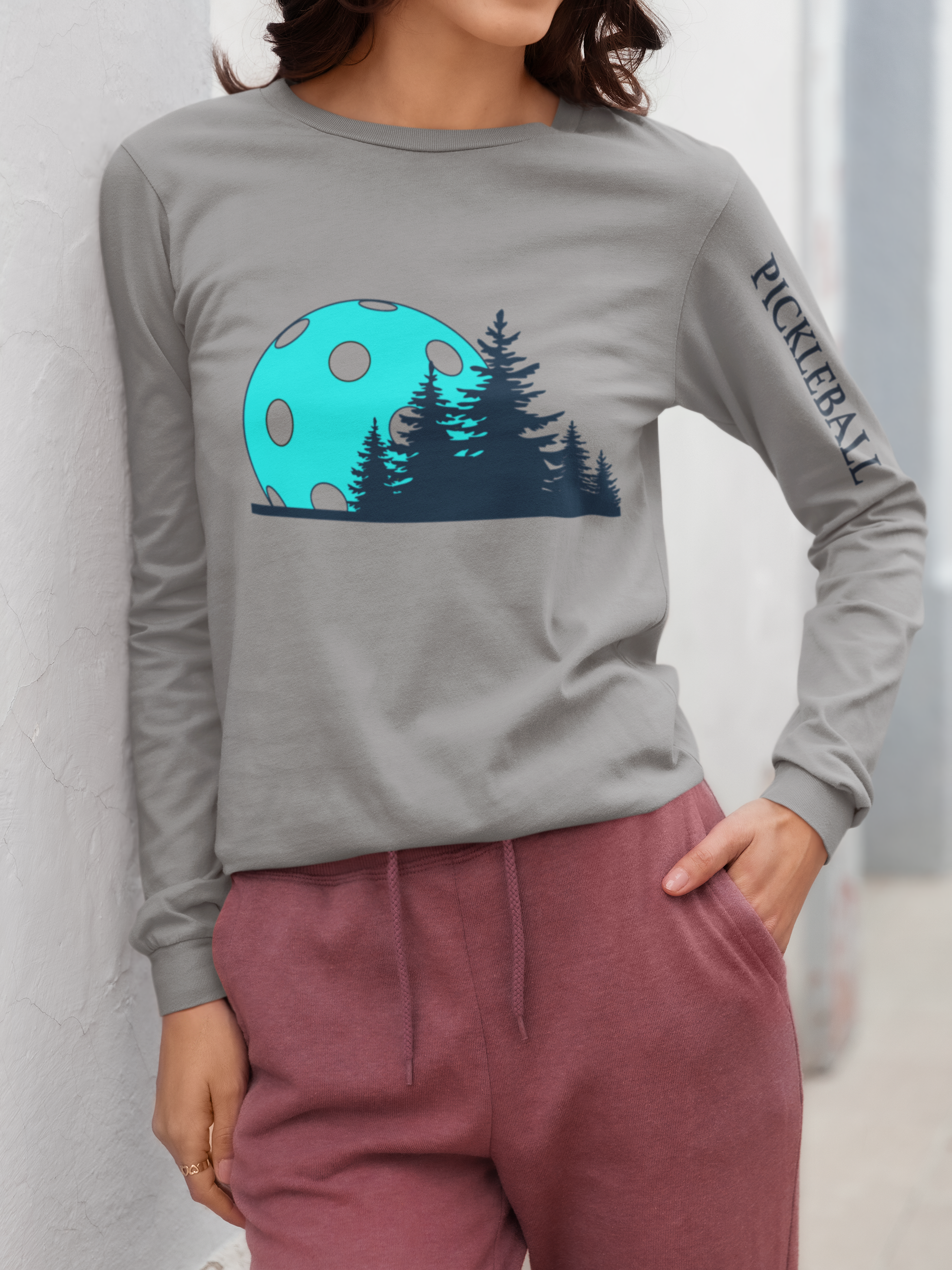 bella-canvas-long-sleeve-tee-mockup-featuring-a-cropped-face-woman-leaning-against-a-wall-m37311(1).png