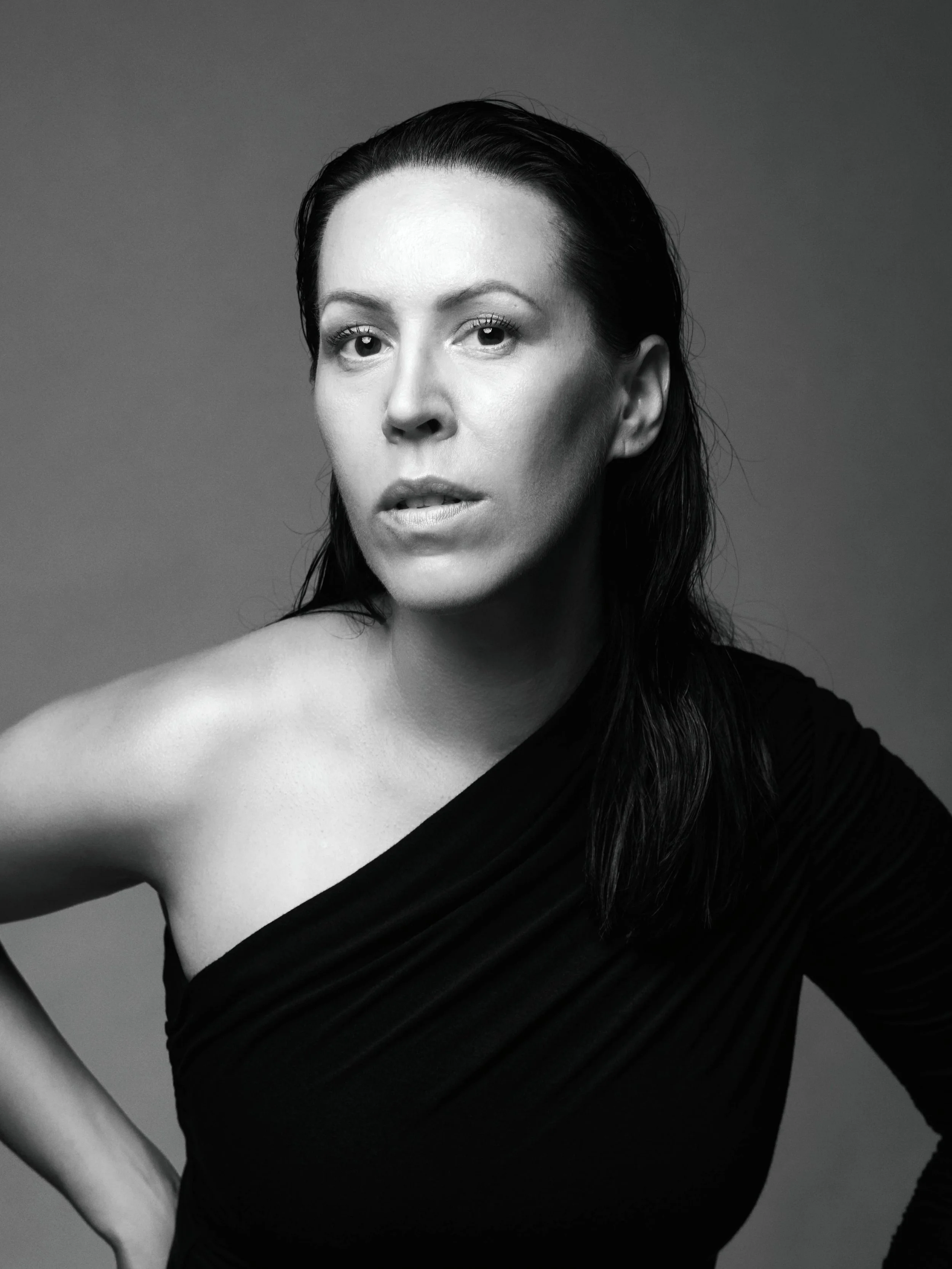 Black-and-white portrait of Finnish fashion designer Anne-Mari Pahkala, photographed by Elina Simonen.
