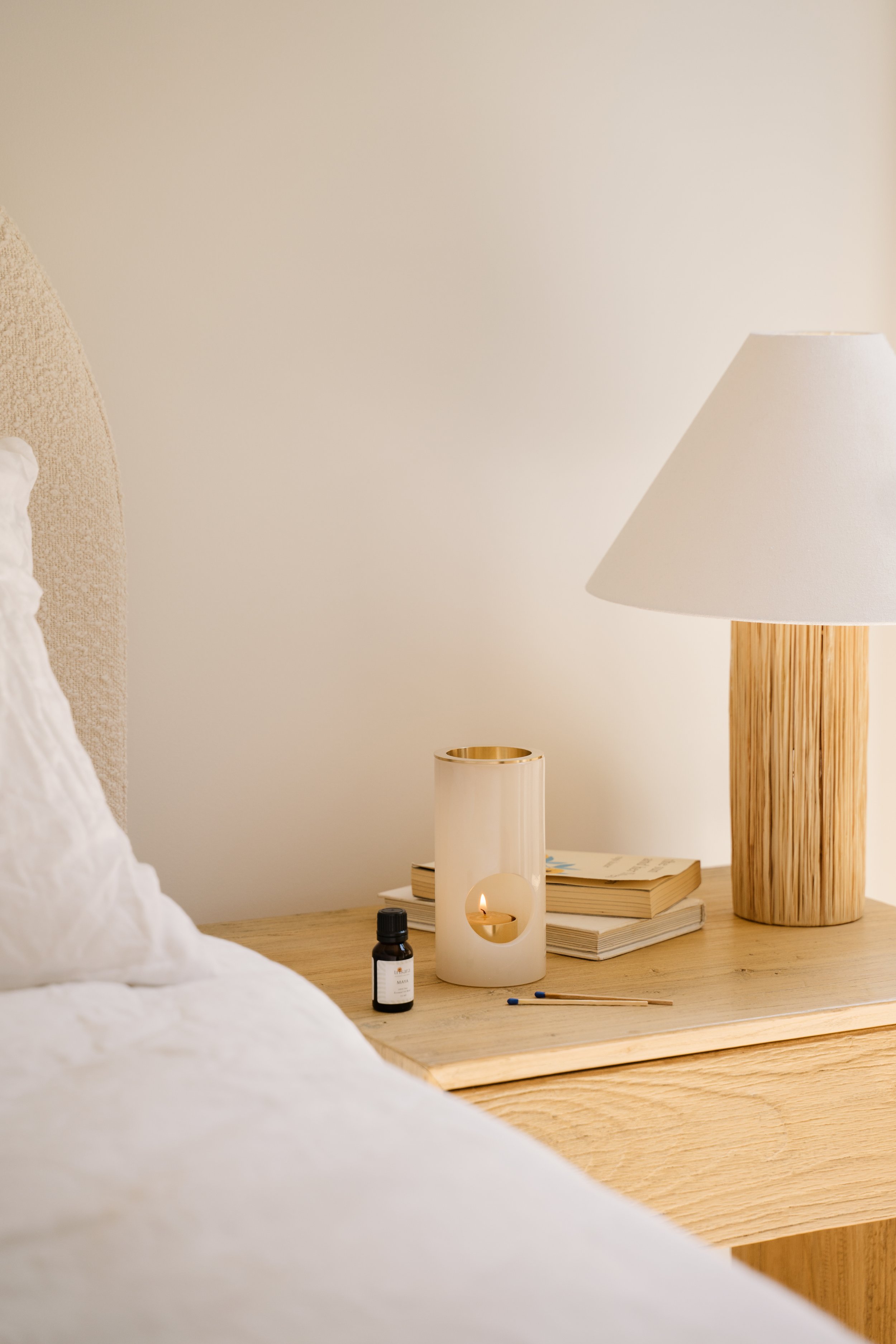 candle on bedside table