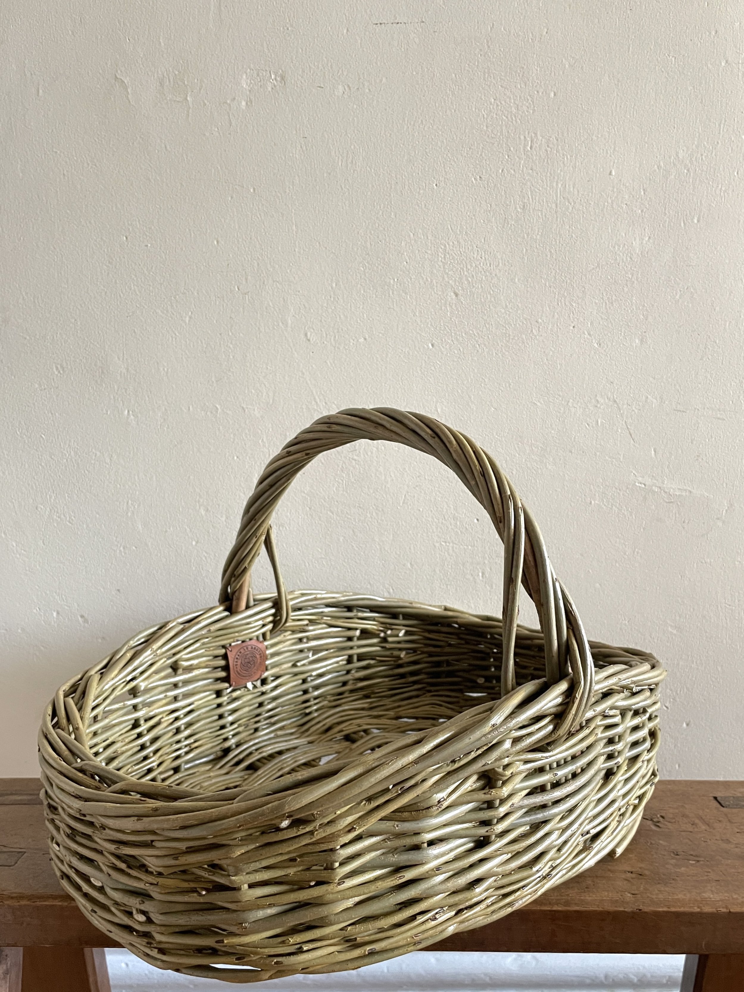Oval Handling Basket Diagonal Portrait.JPG