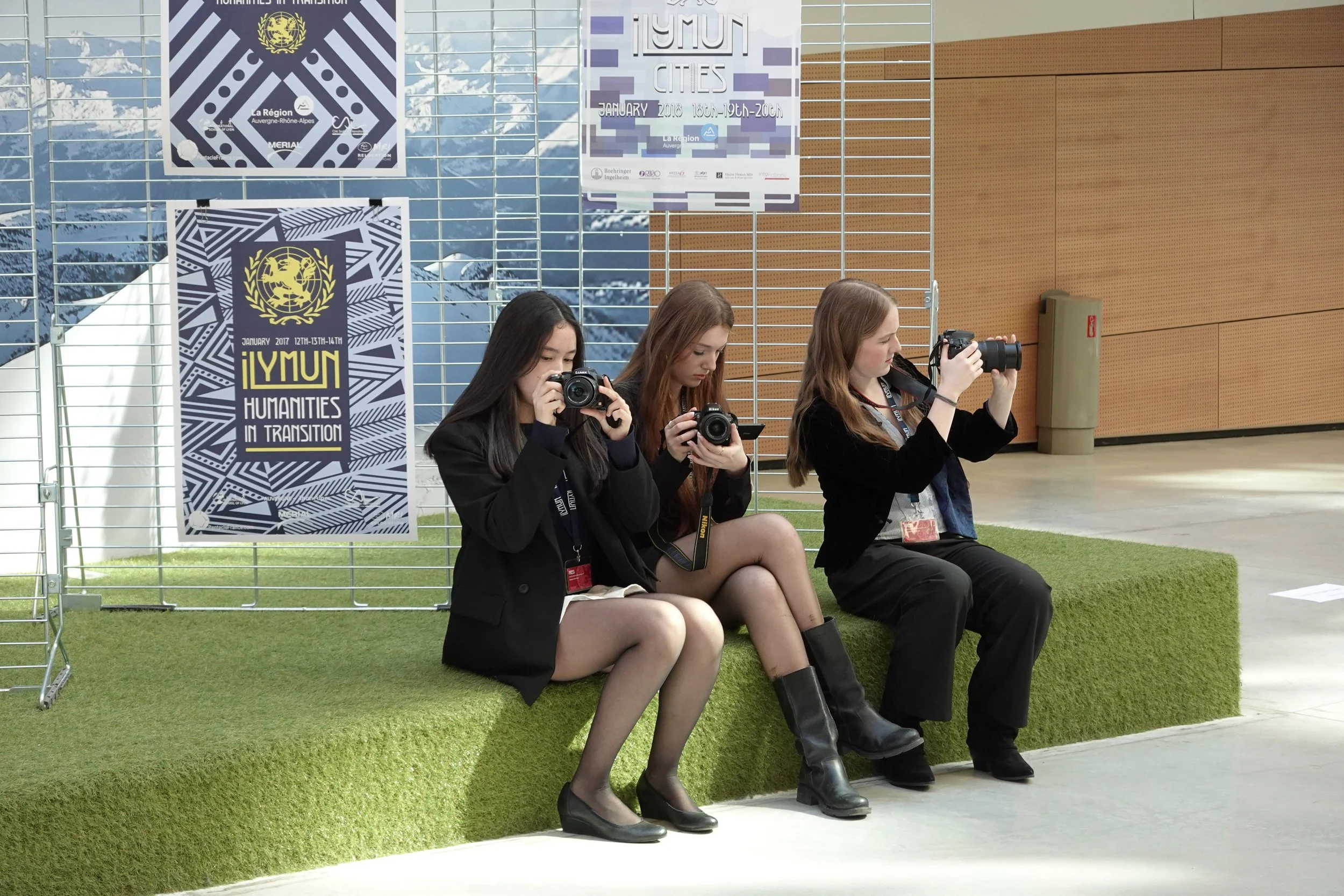 Press girls taking photos.JPG