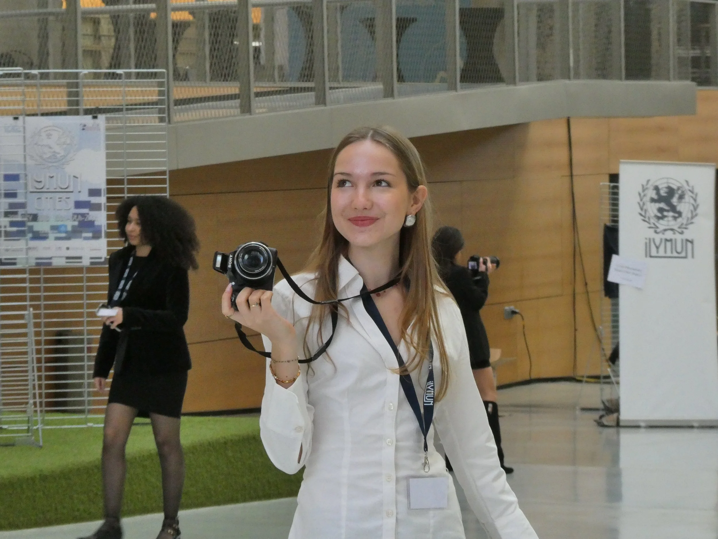 Emma L holding camera.jpg