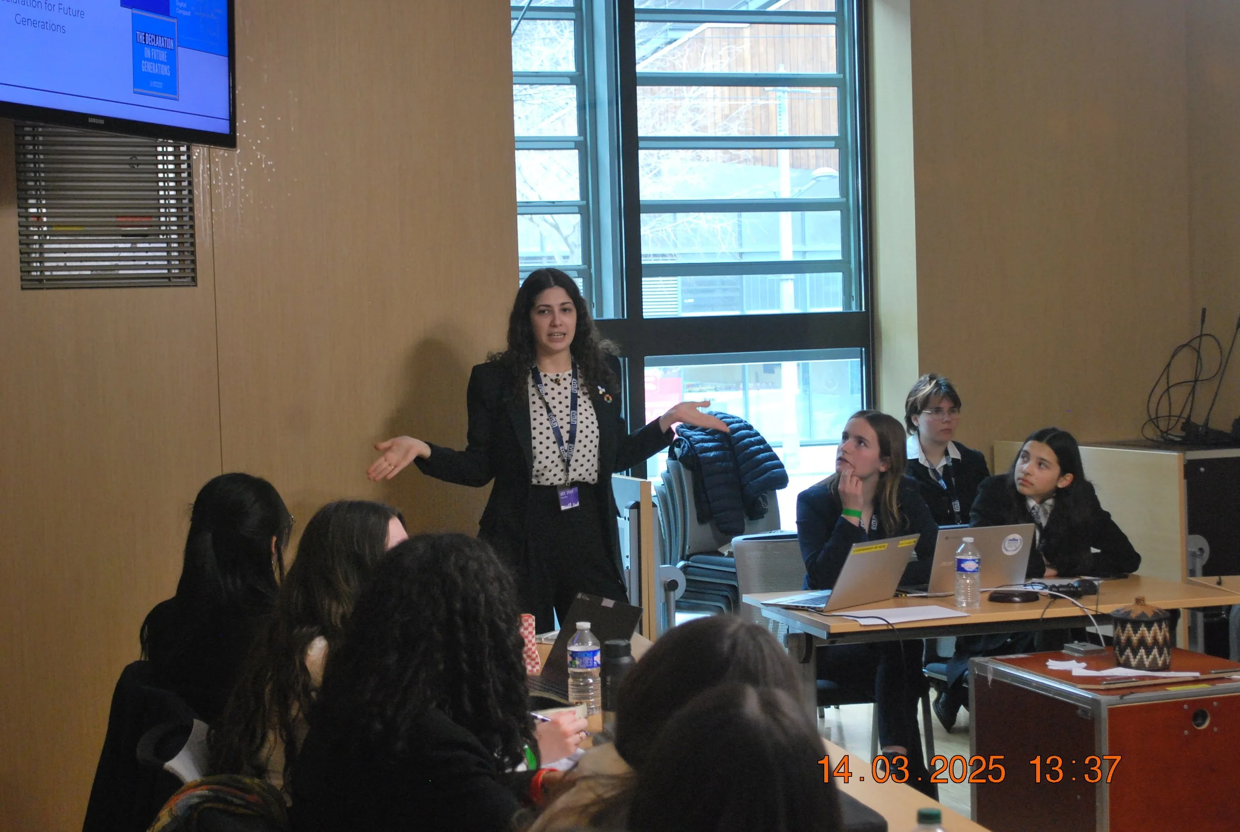 Guest Speaker in Action Assembly 12.JPG