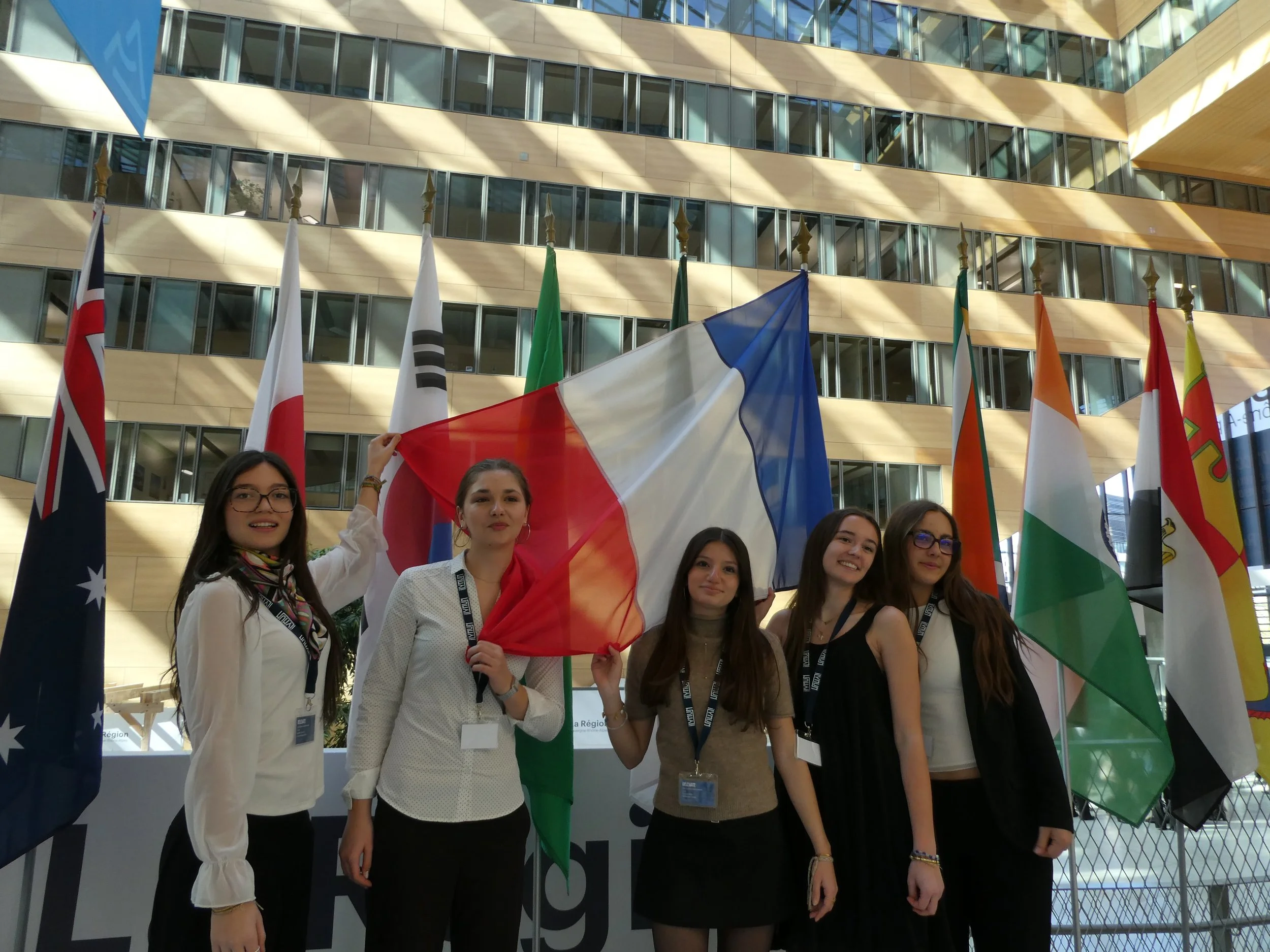 Delegates holding flag.jpg