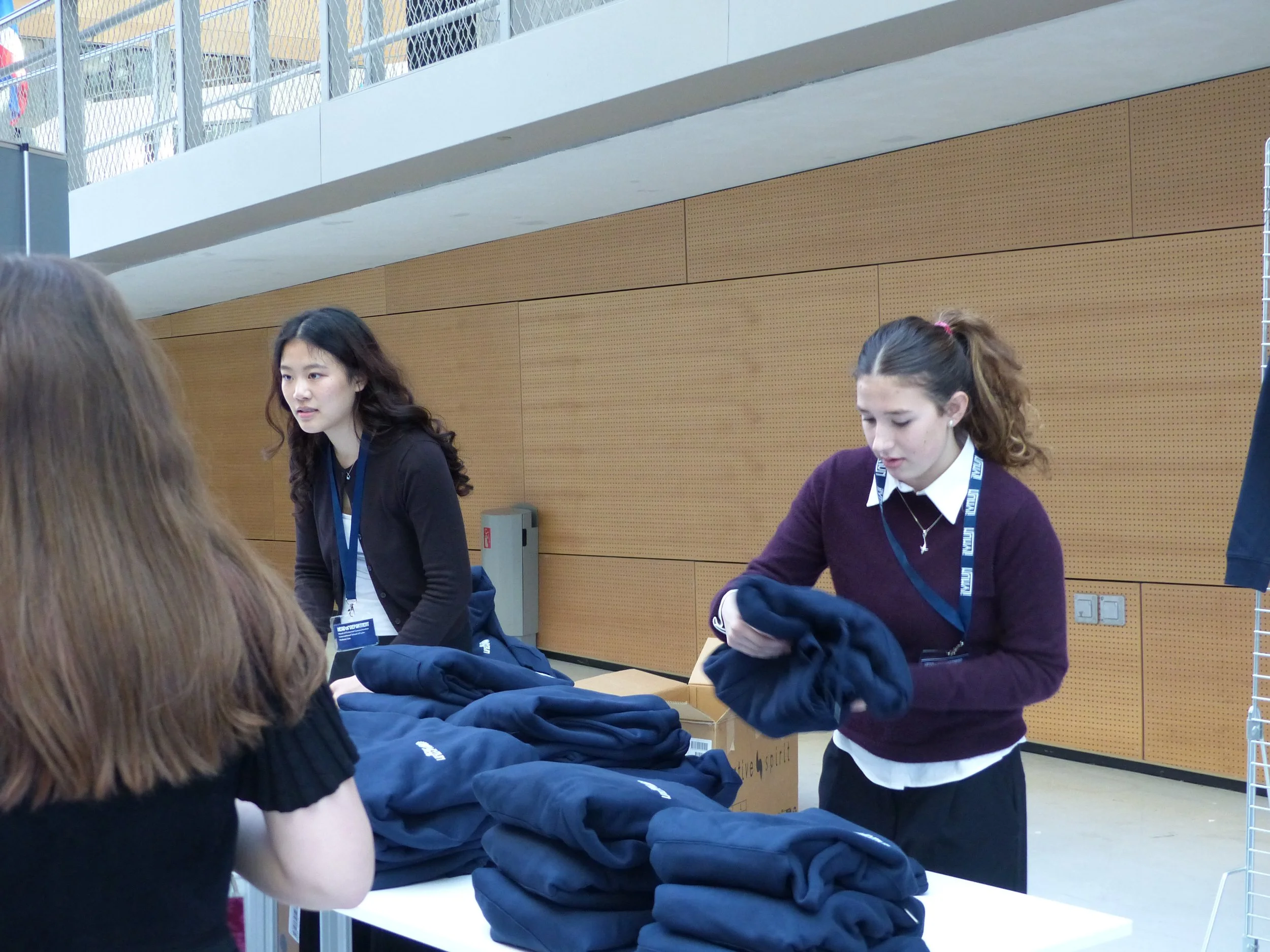 People distributing hoodies.JPG