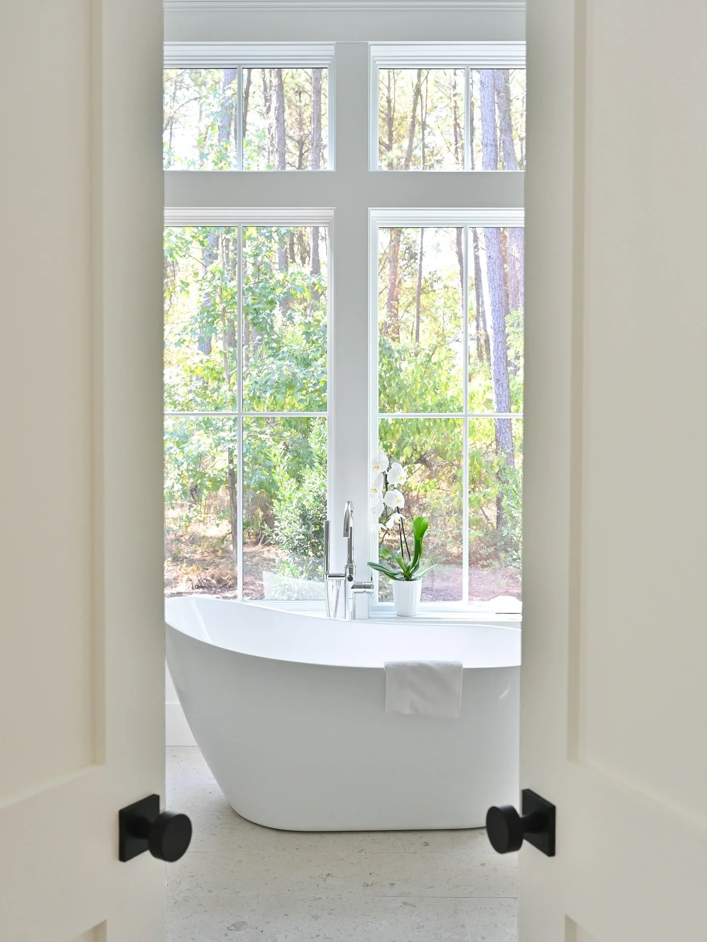 ✨ Retreat to serenity ✨
This principal bath is designed to feel like your own private spa &mdash; where natural light, soothing textures, and calming finishes come together to create the perfect escape. From the oversized soaking tub to the walk-in s