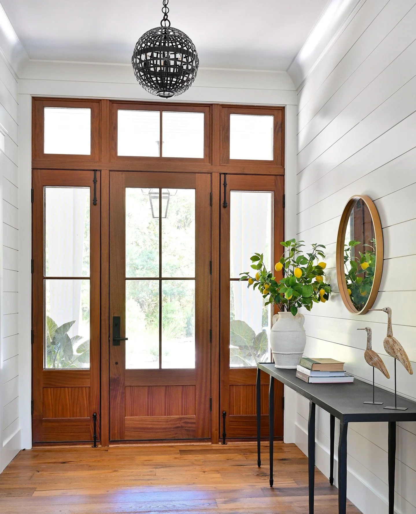 An entry that greets you with warmth, light, and a hint of the unexpected. 🍋⁠
⁠
Designed to feel effortless. Built to last a lifetime with Bellwether Design + Build.⁠
⁠
Vendors:⁠
Mahogany Front Door: @coastalsashanddoor⁠
Shiplap Walls: @buildfcbs⁠
F