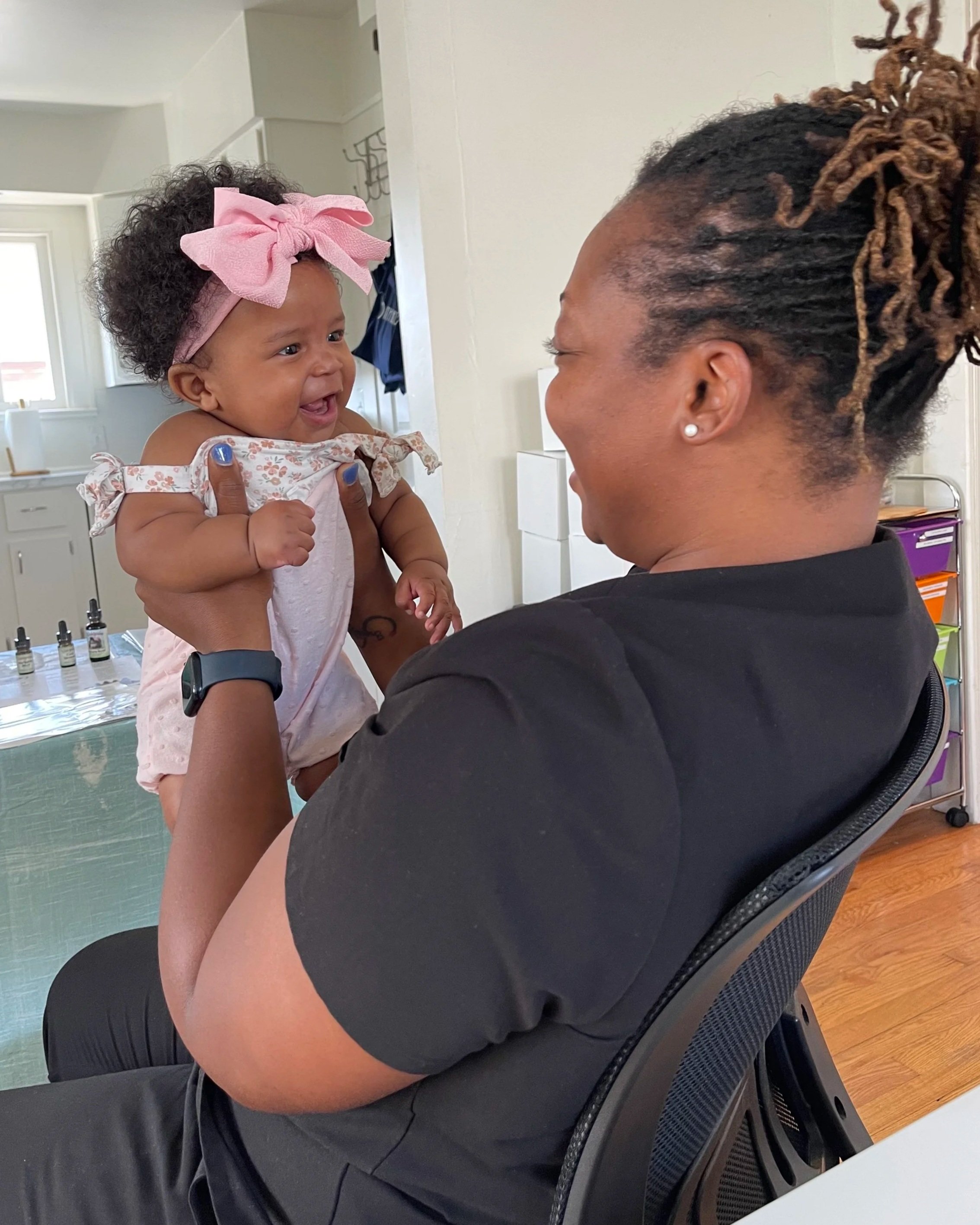Clinic+Midwife+Elikem+and+baby.jpg