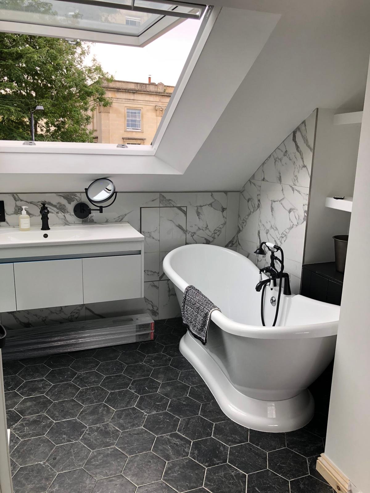Top hung white painted Velux.JPG