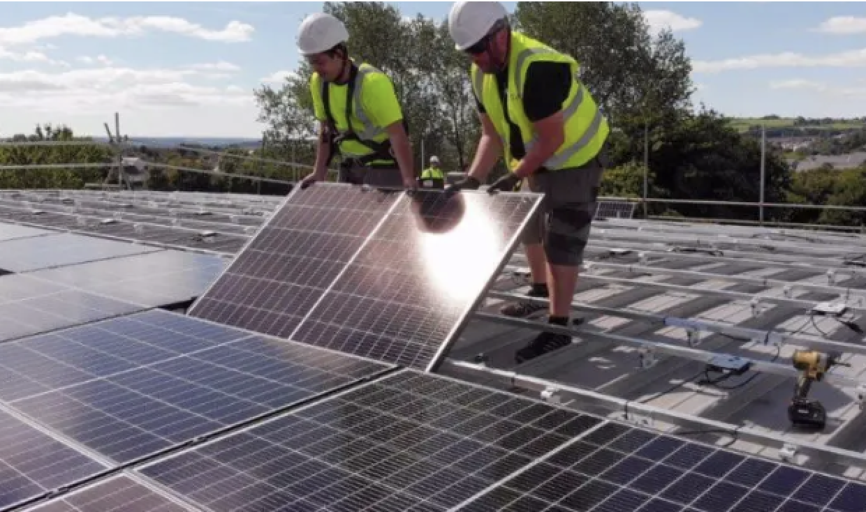 Community-owned solar co-op secures £1.4m investment to expand rooftop solar across Wales
