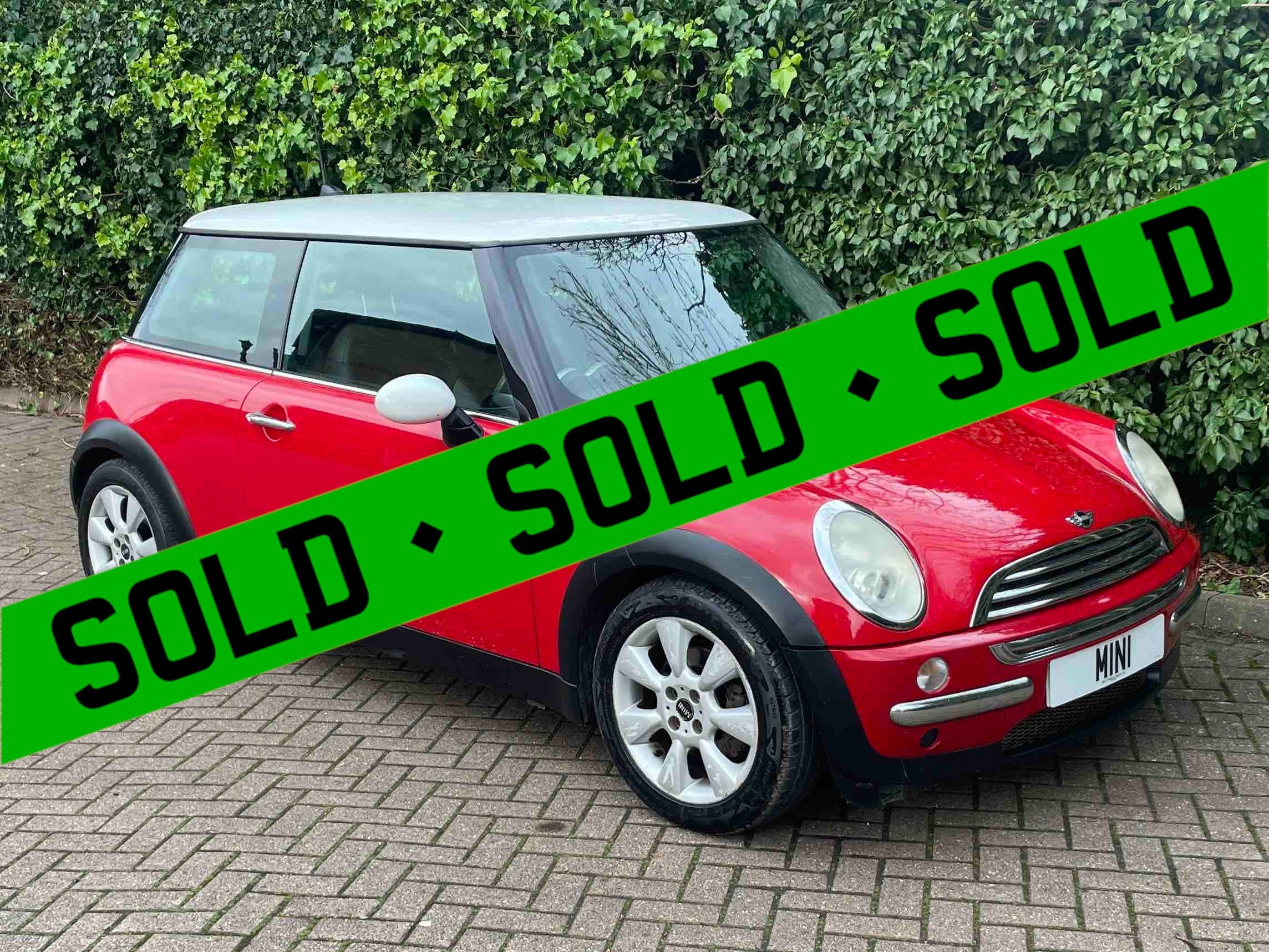 LC06 UGX Red Cooper Auto SOLD.jpg