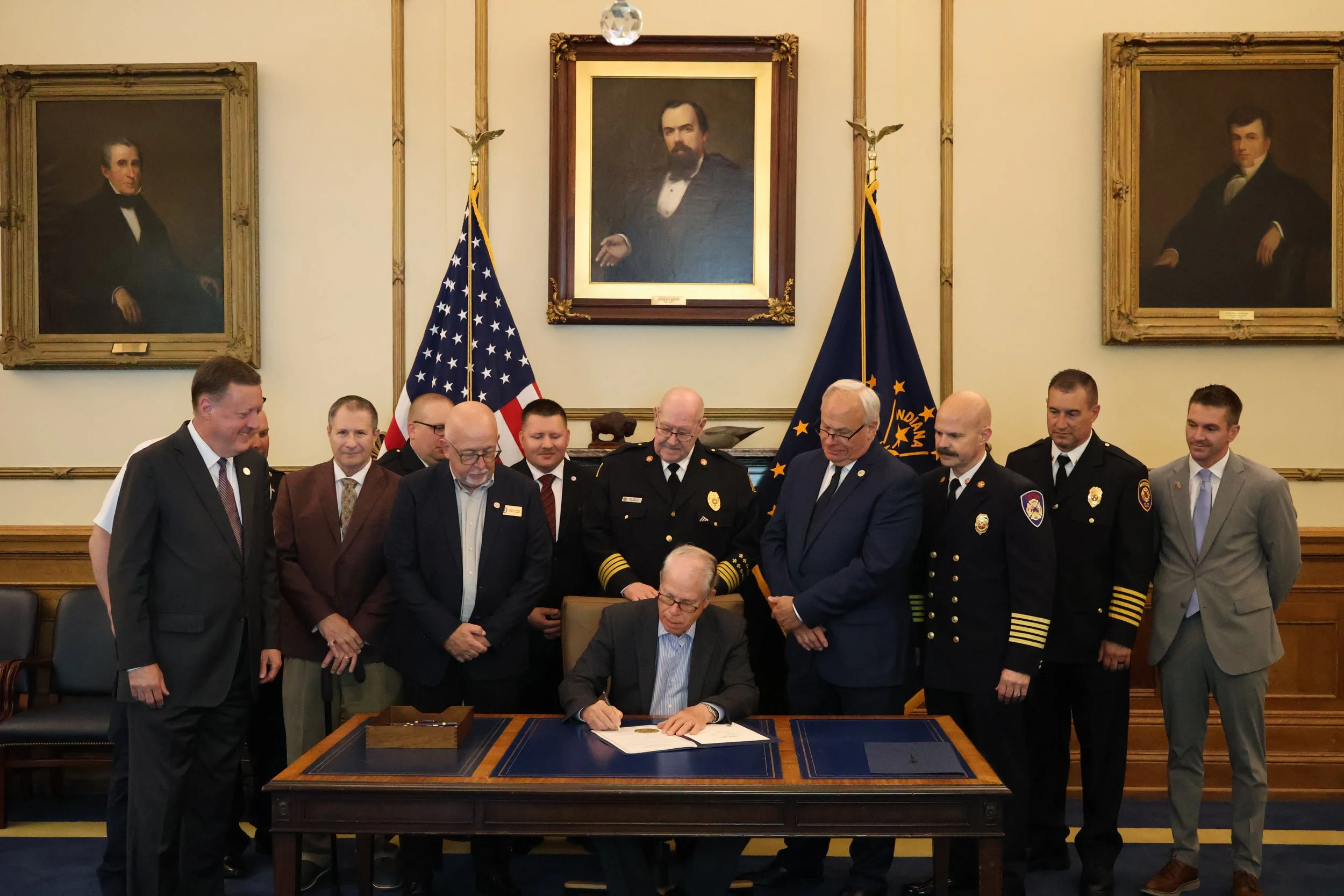 Novak celebrates ceremonial signing of HEA 1048, boosting support for volunteer firefighters