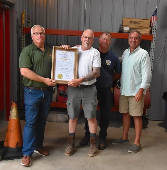 Novak presents former Coolsprings Fire Chief with the Circle of Corydon