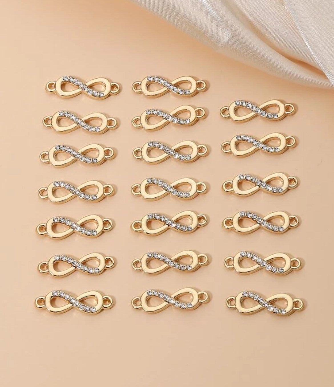 Infinity Connector_Goldwithdiamons.jpeg