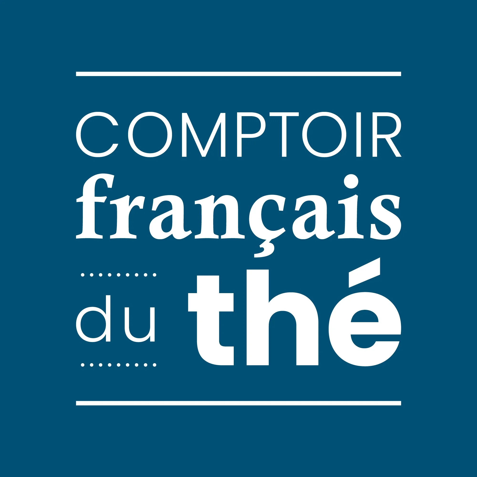 Sign with the text 'Comptoir français du thé' on a blue background.