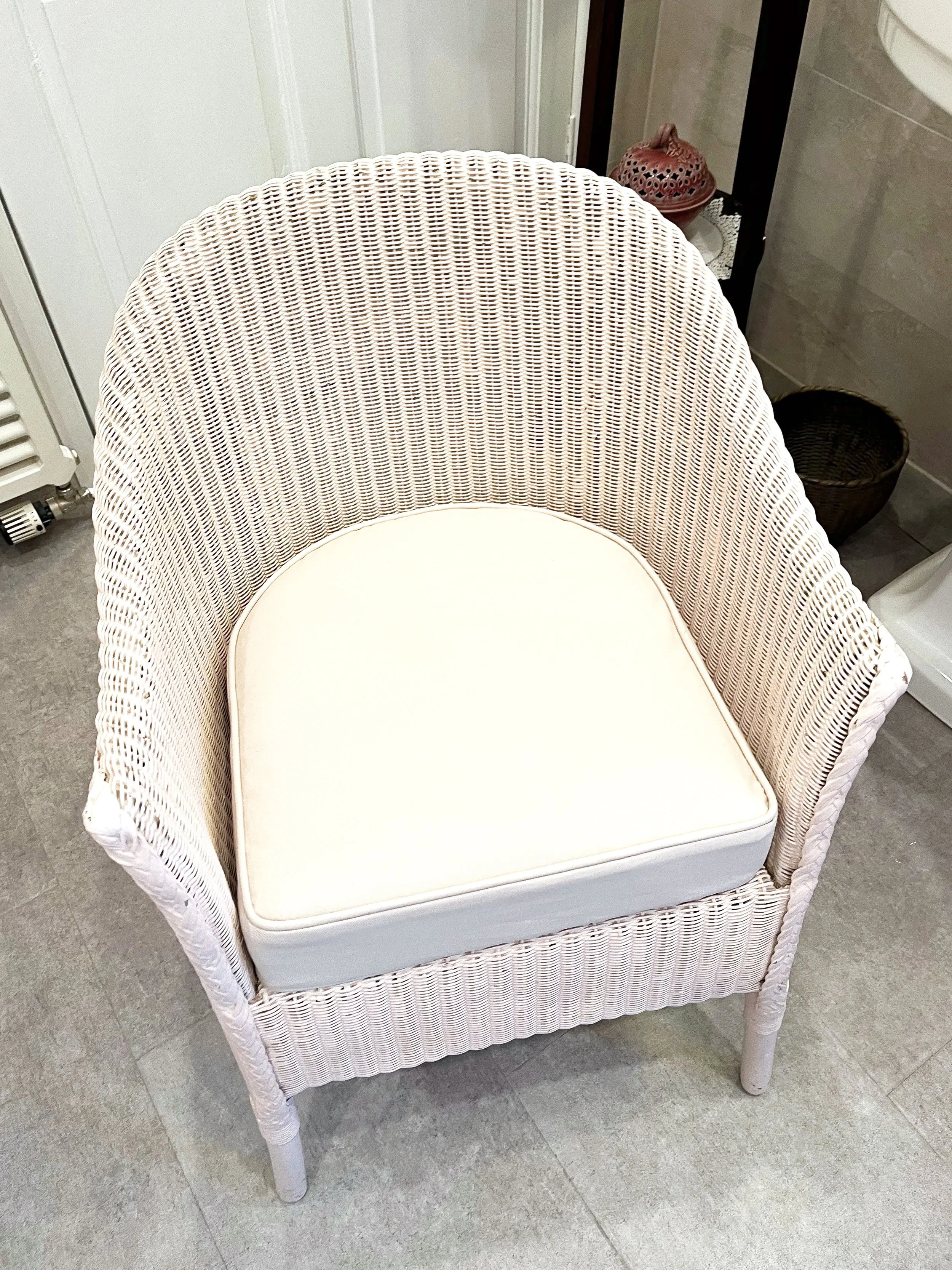 Bespoke seat pad cushion to finish off a lovely little wicker bathroom chair. 