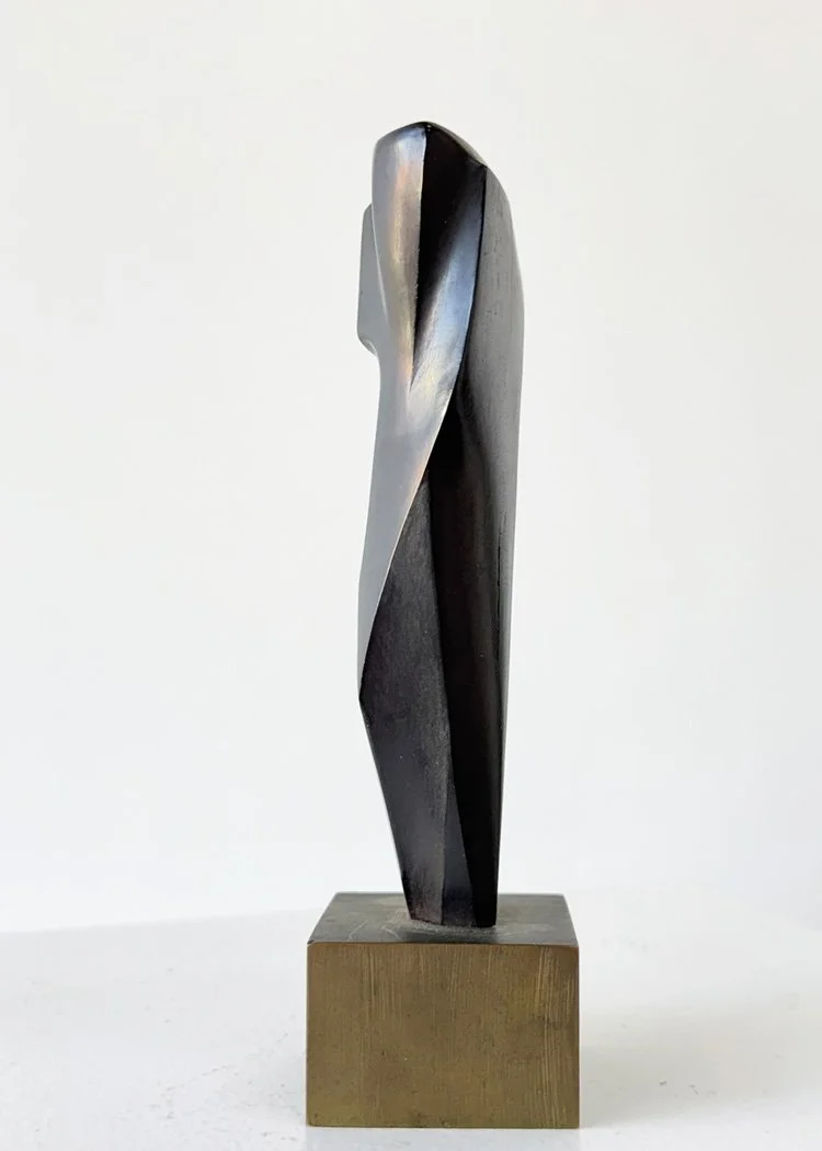 Abstract modern sculpted wood sculpture by Angelo Granata with geometric design on a square base