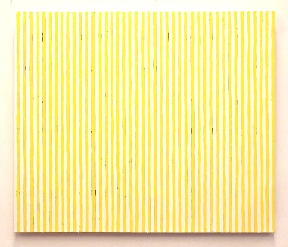 A painting with vertical yellow and white stripes, framed in yellow.