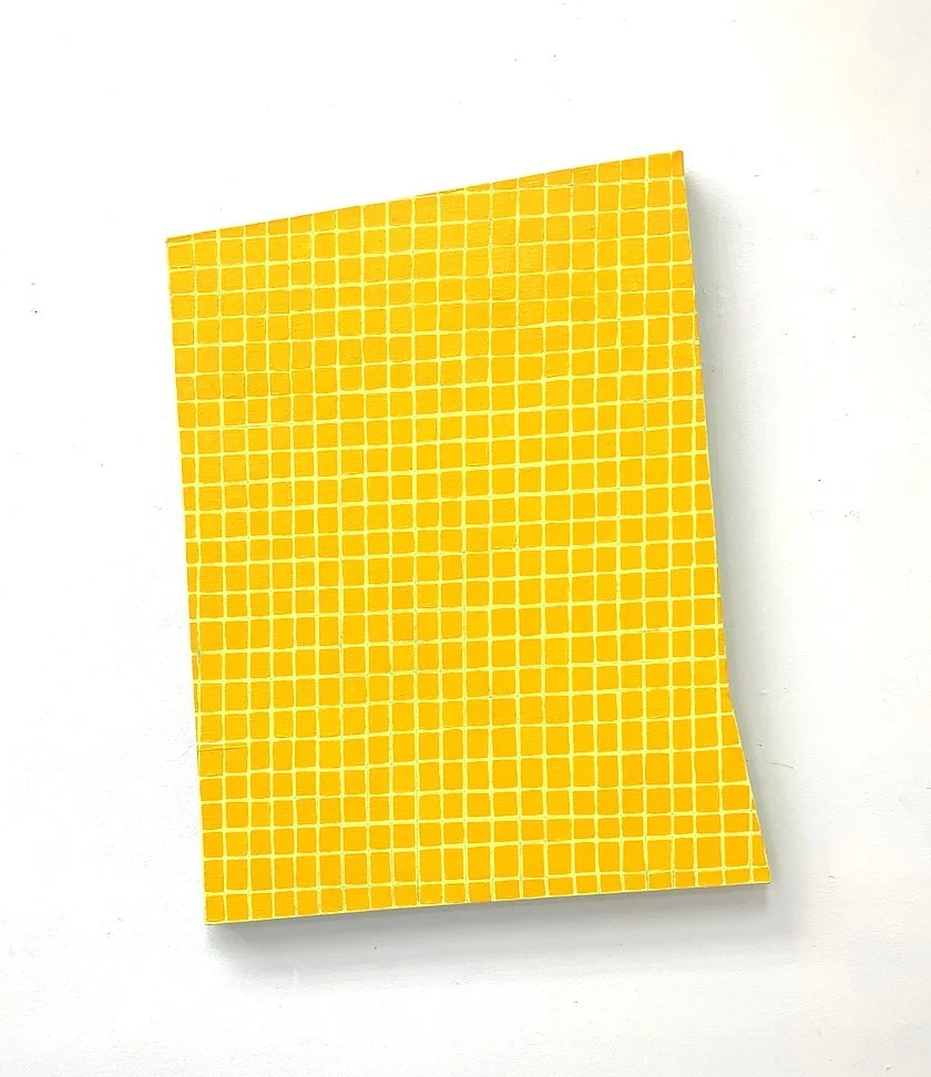 Yellow painting with small square tiles on white background