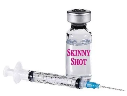 A small glass vial labeled "Skinny Shot" and a syringe with a needle.
