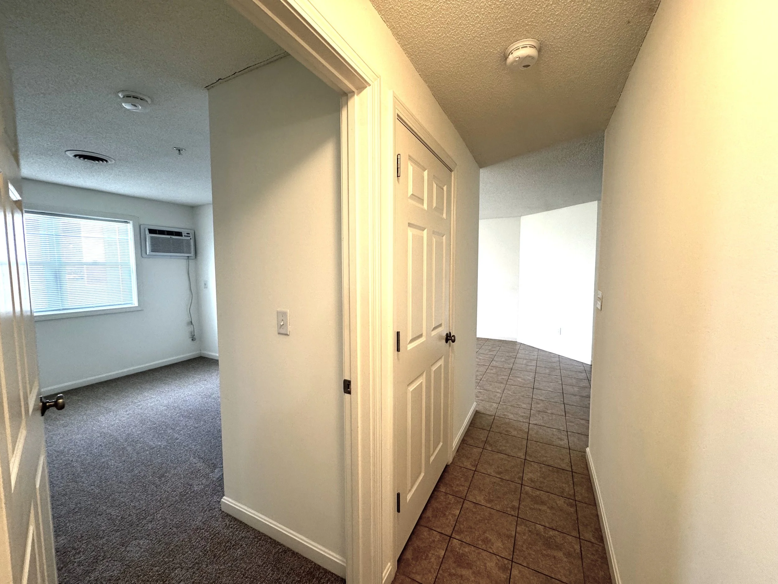 Hallway view into second bed and dining.jpg
