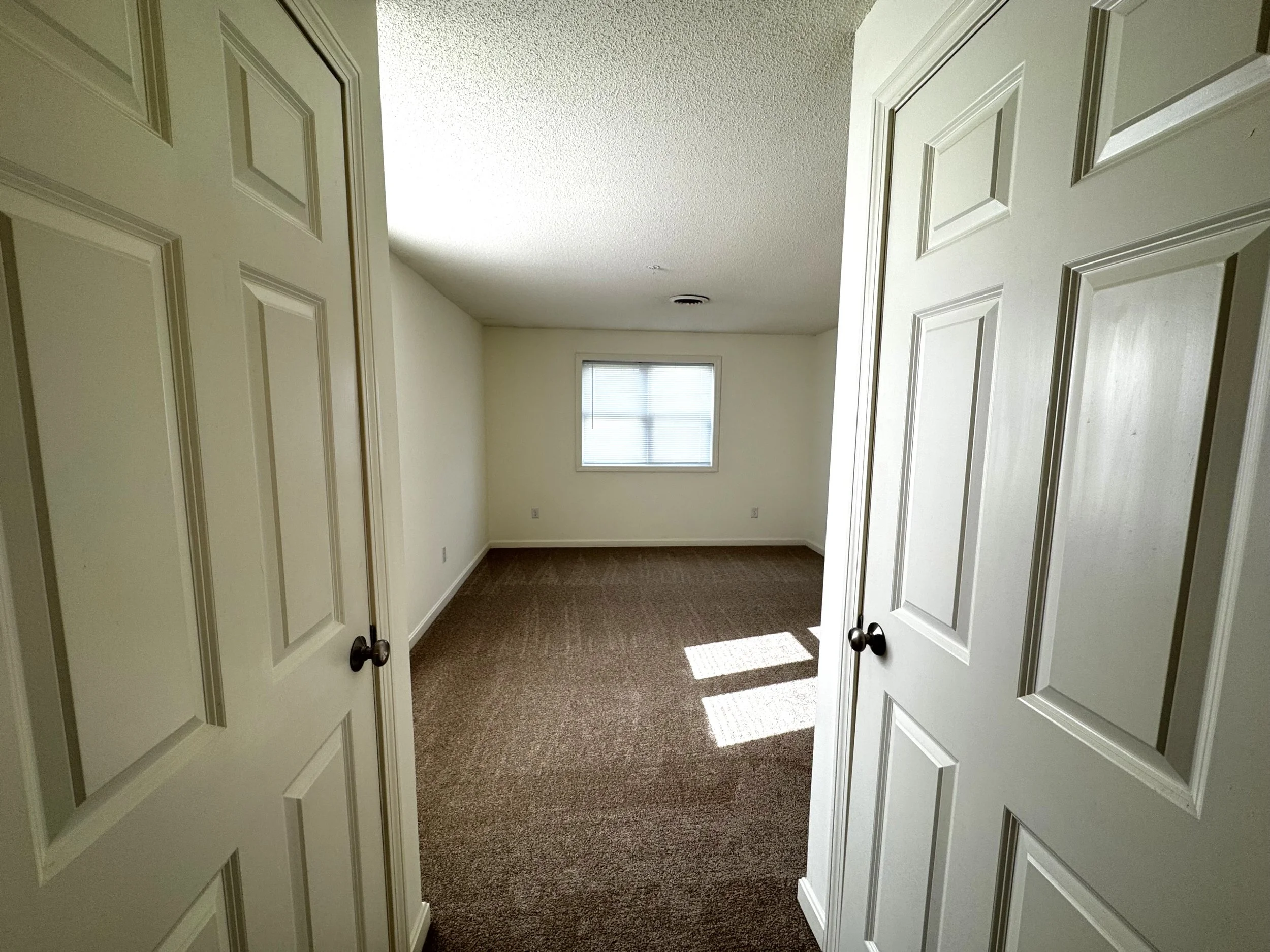 View into master bed from bath.jpg