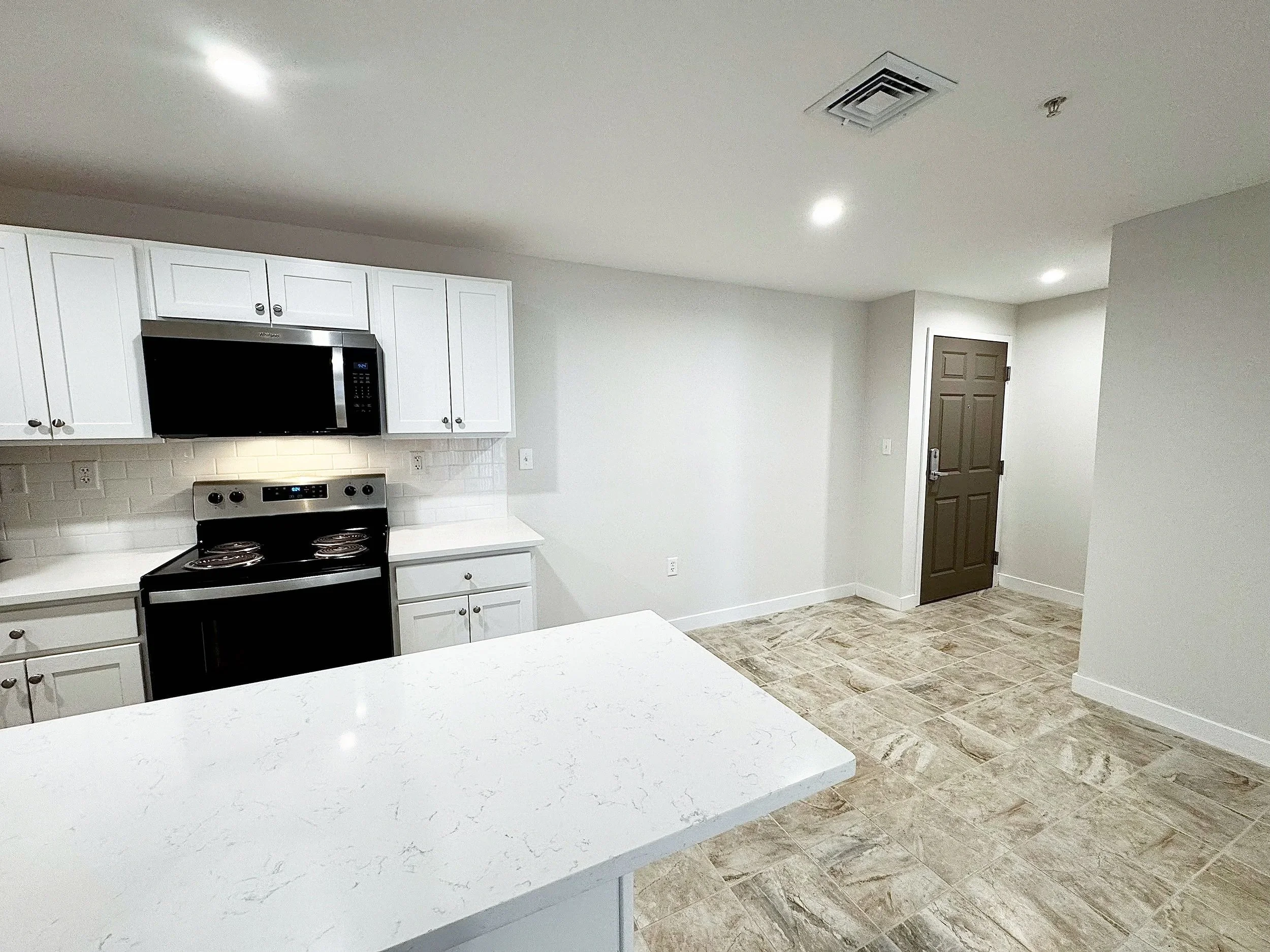 Quartz Collection: 2/2 Unit 116: $2100 *Newly Renovated First Floor Unit — *Features a W/D Hook Up, Larger Kitchen w/Quartz Countertops &amp; Two Beautifully Tiled Showers*