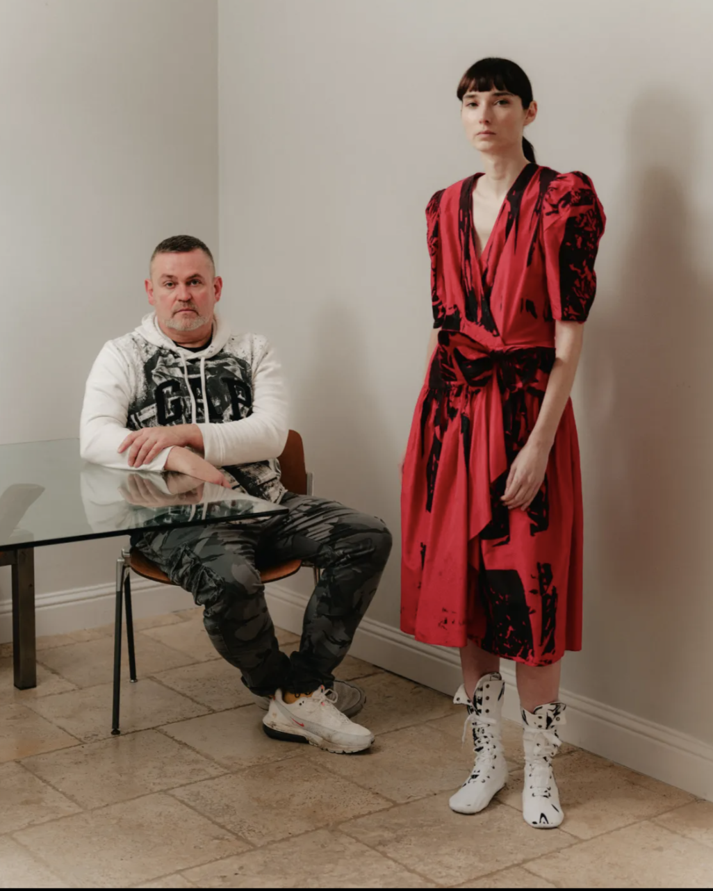 Designer Simon Ungless with a model at his residency at Atelier Jolie in New York City.