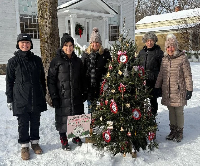 Decorating tree at Mill Race Village 
2025
