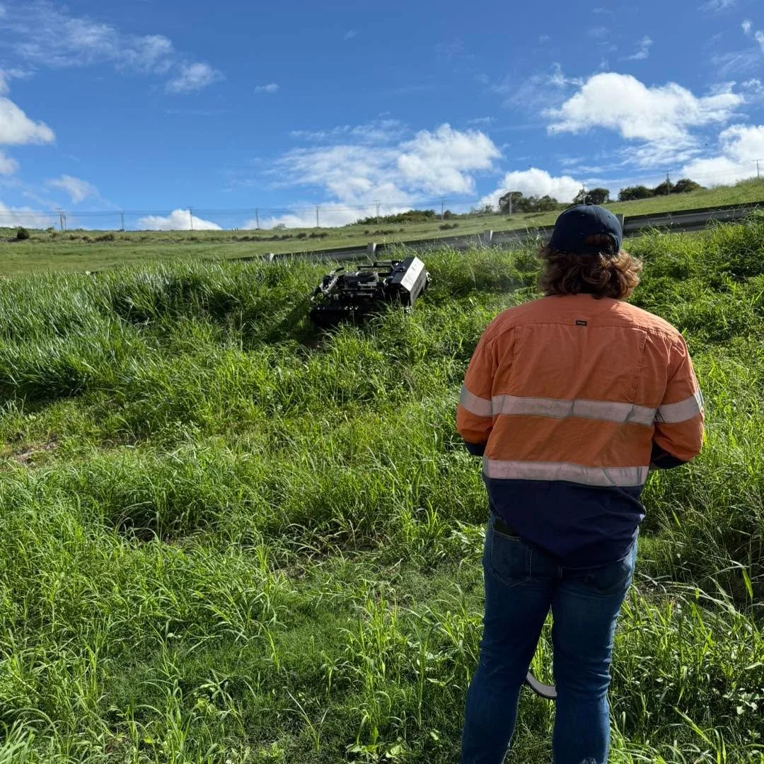Here is an AutoSlasher being demonstrated at a waste management facility in Brisbane.

The property includes grassed slopes too steep for a tractor and slasher or ride-on mower. Previously, the site was maintained by a subcontractor using a posi-trac