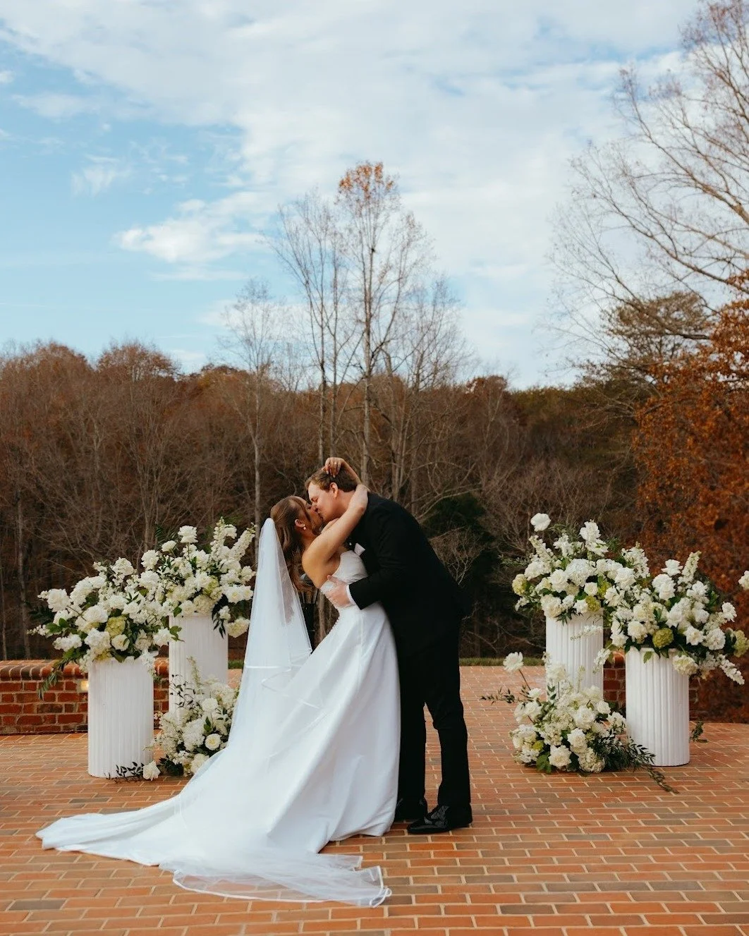 On the fifteenth of November, as the autumn landscape achieved its most refined beauty and the leaves turned to a final, rich gold, Keaton and Ryan marked the beginning of their forever. Their commitment is a constant, unwavering pillar of light, per