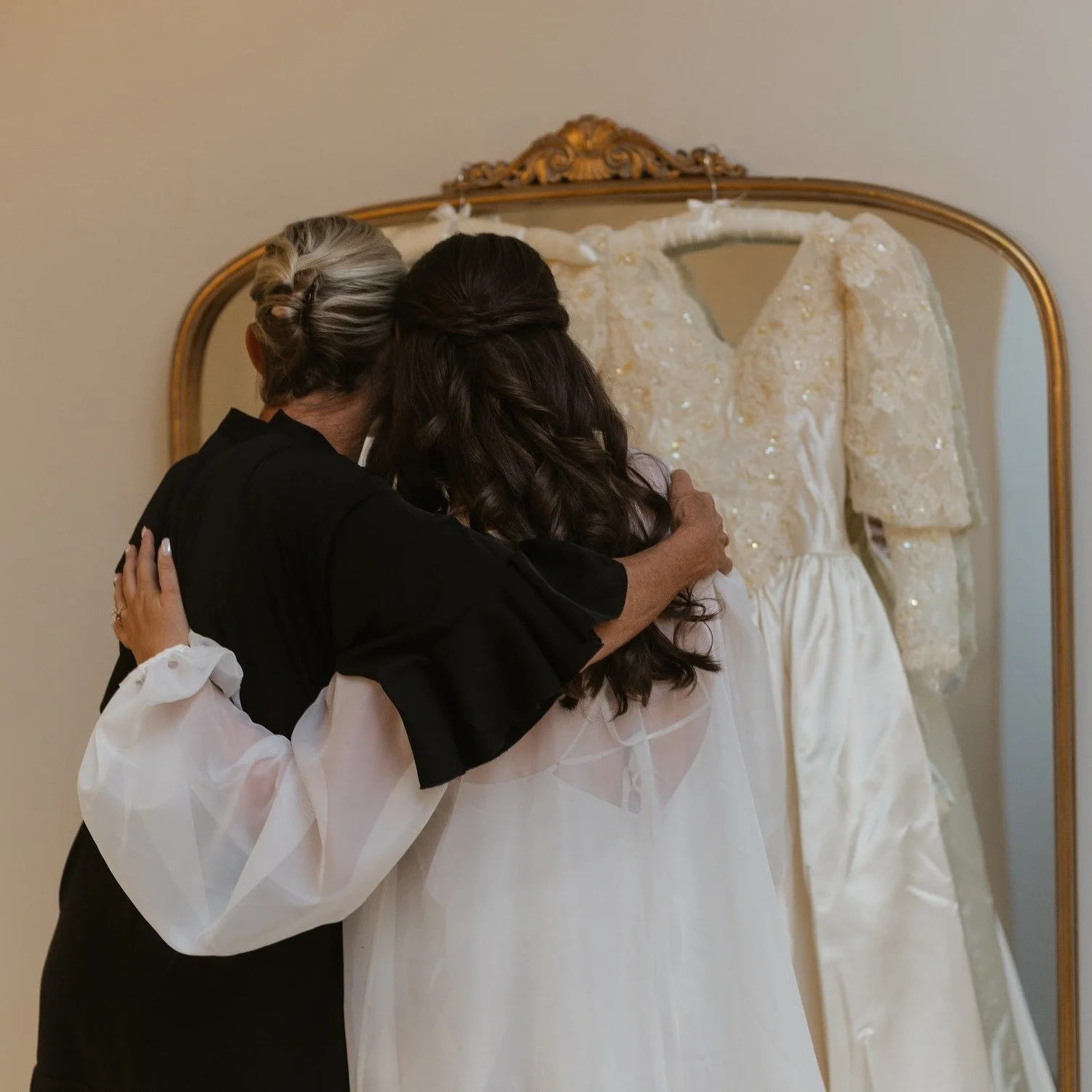 The hands that held yours then are the same ones steadying you now 🕊️✨

These quiet morning minutes carry a weight that no schedule can define. It is the way she catches your eye in the mirror or the silence shared during those final few buttons. It