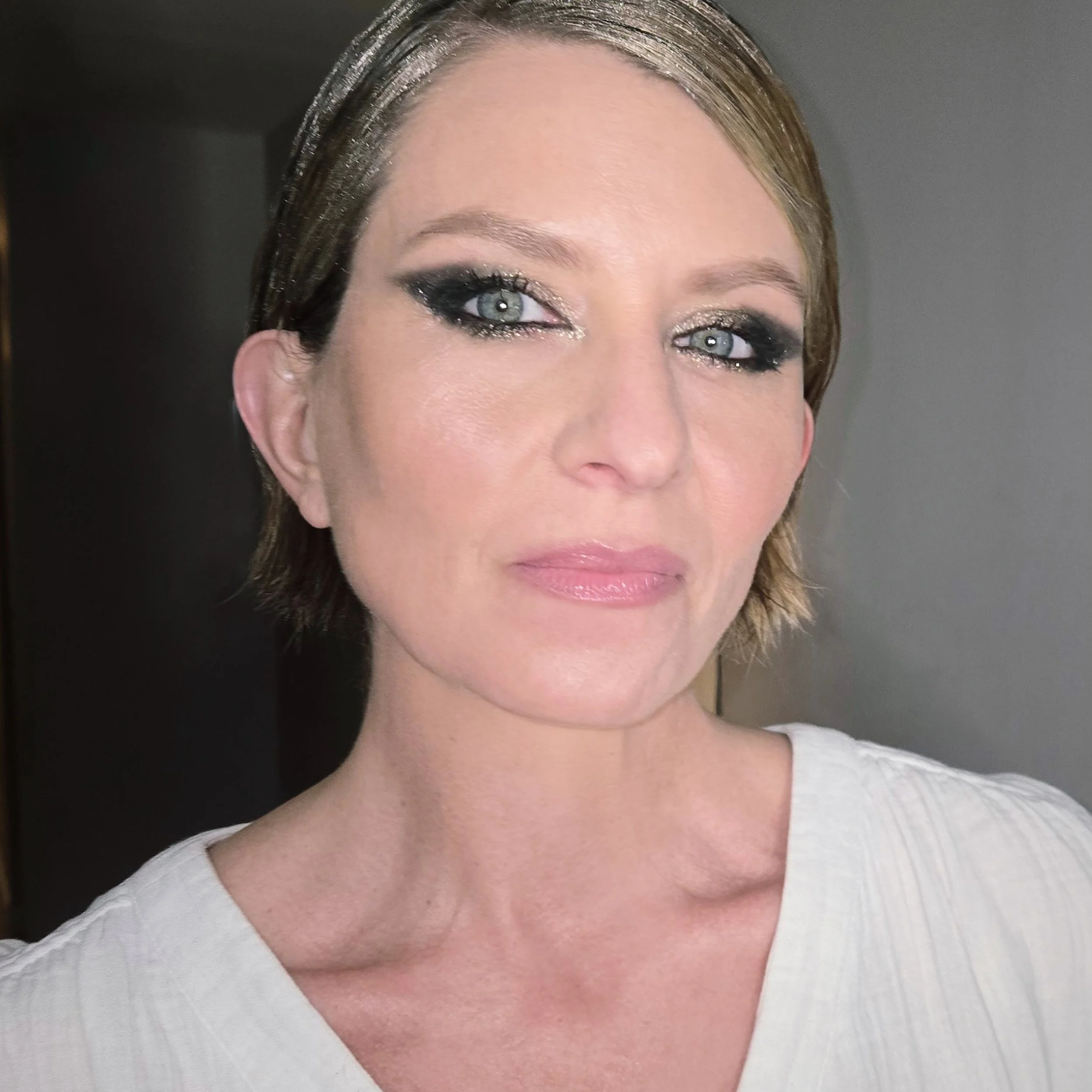Because subtle was never part of the assignment ✨️

It was so much fun getting beautiful @melisallison ready for the #mothball2026 Showcasing her amazing eyes with the powerhouse combination of ultra smoky and glittery...#felinefatale #metallic #glow