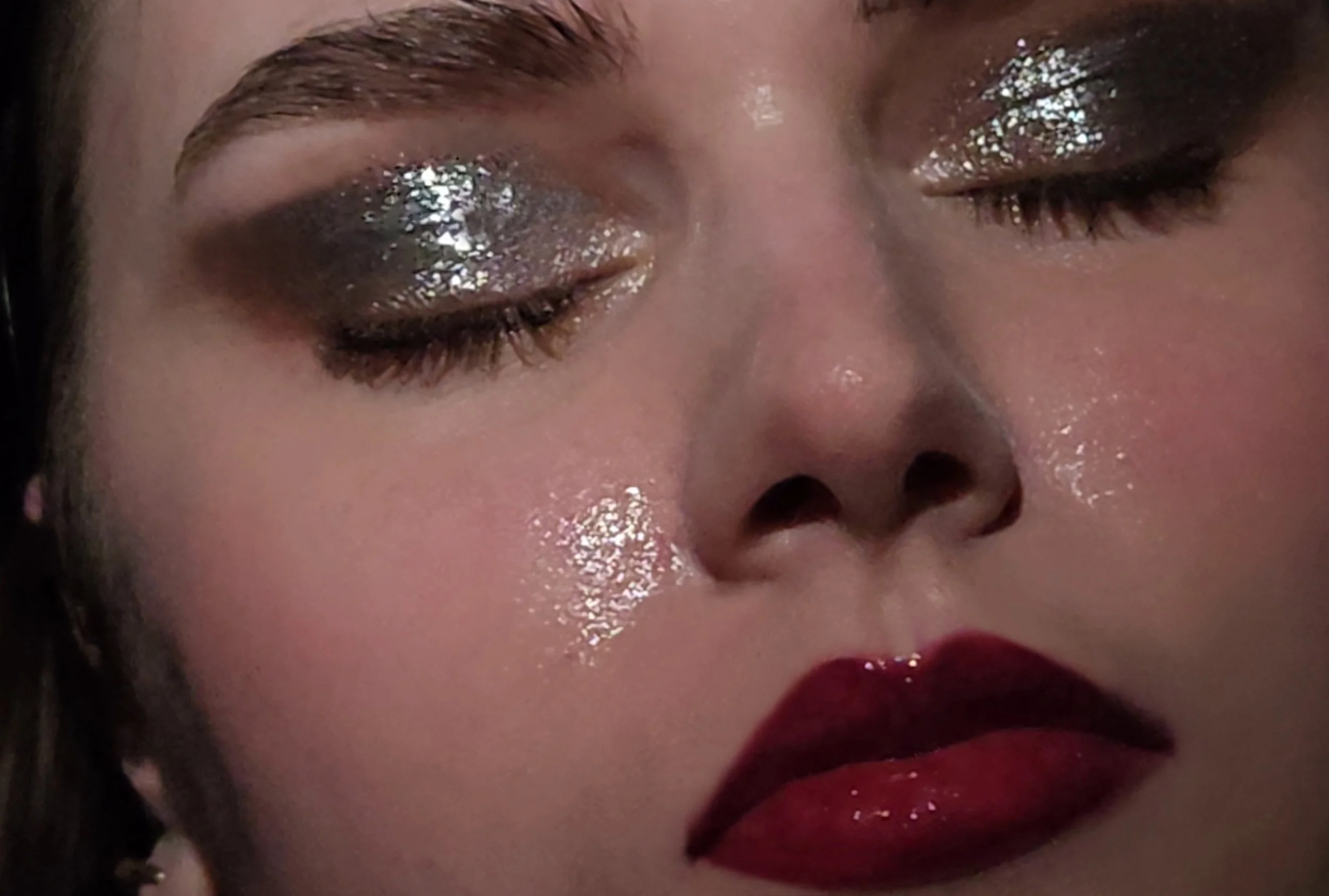 Close-up of a gold glitter eye