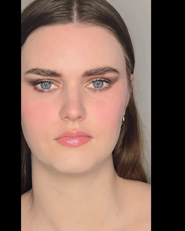 A luminous, signature beauty look showcasing a refined “lit-from-within” glow, groomed brows, and a natural glossy lip.