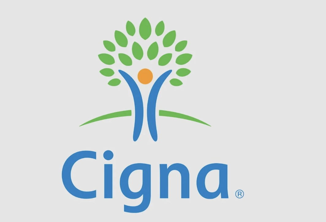 Cigna logo with a stylized tree and the word 'Cigna' underneath.